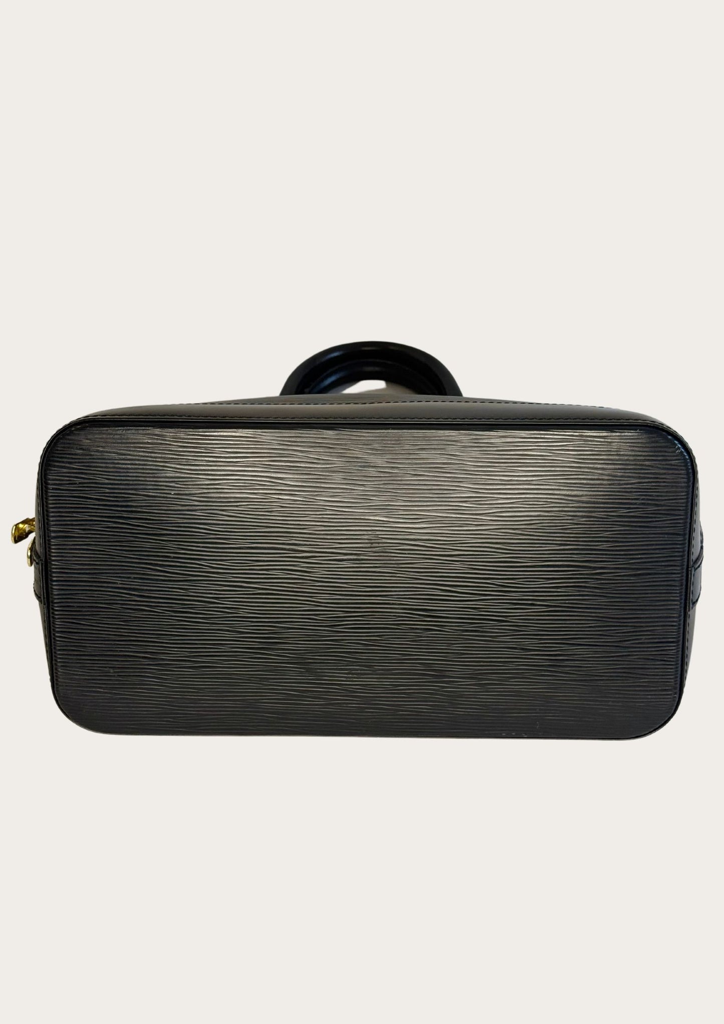 Bottom of Louis Vuitton Alma PM in black Epi leather, vintage and authentic