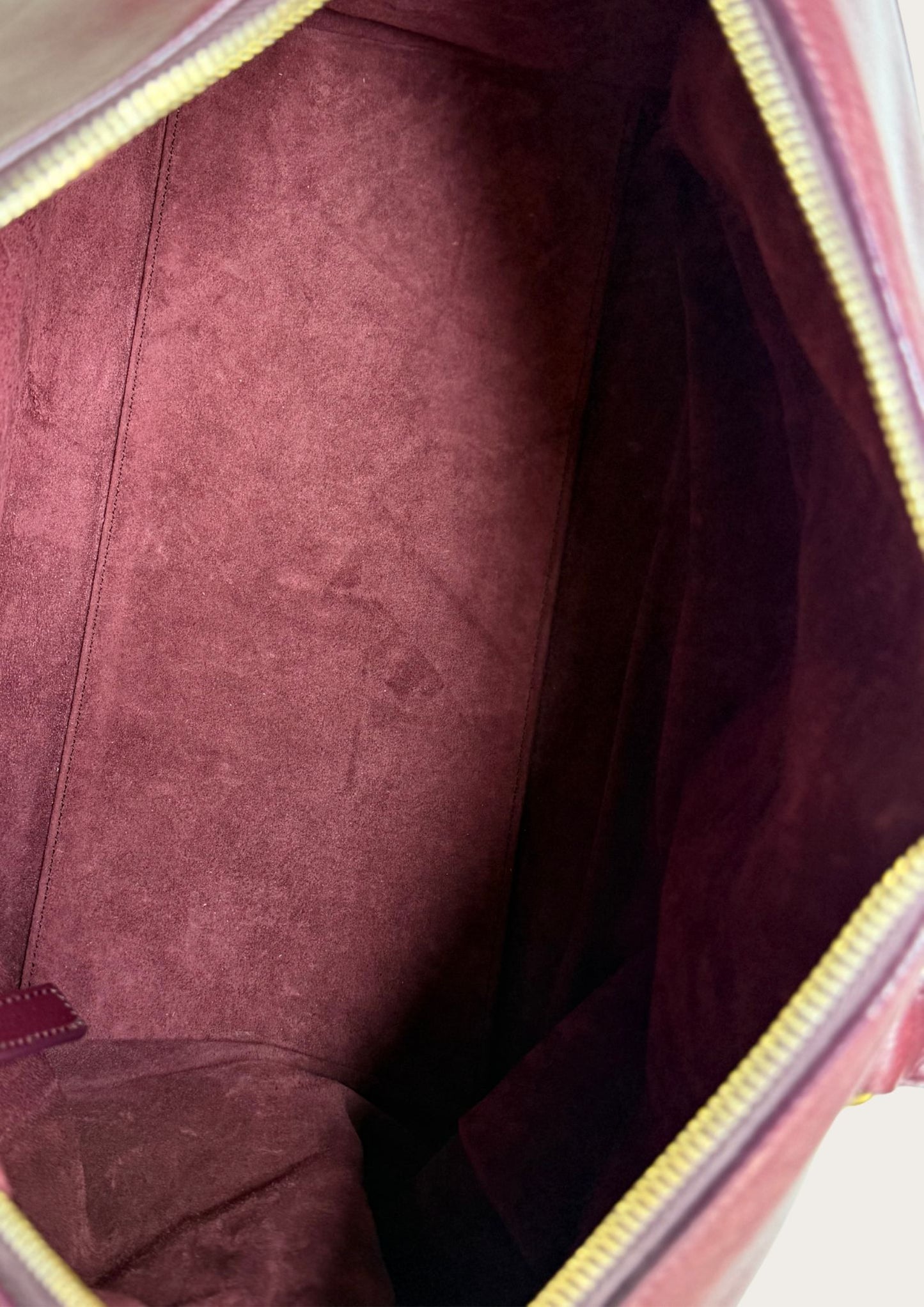 Authentic Saint Laurent Duffle bag (medium) in burgundy red