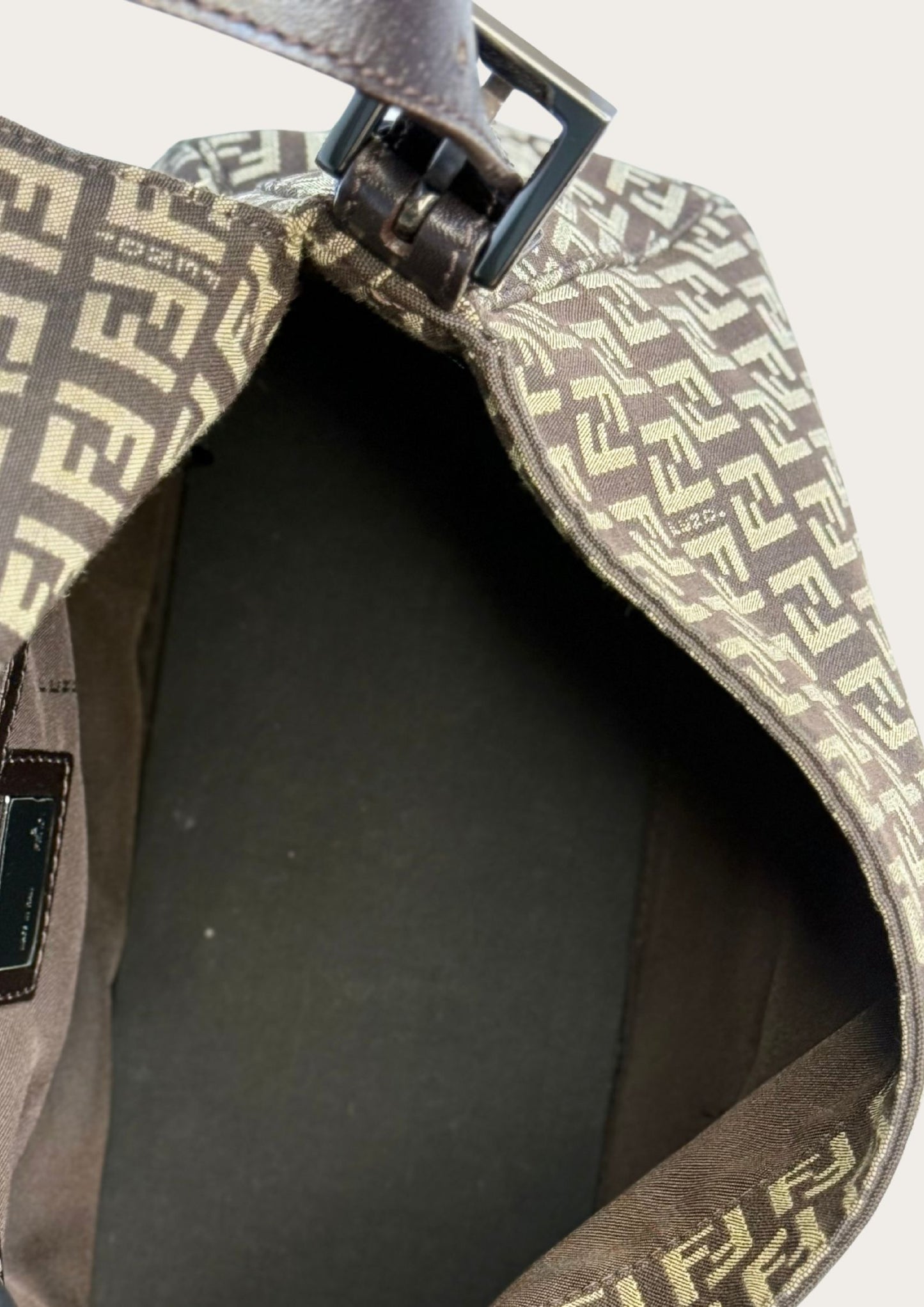 Inside Pre-loved brown Fendi mamma baguette in Zucchino pattern, authentic