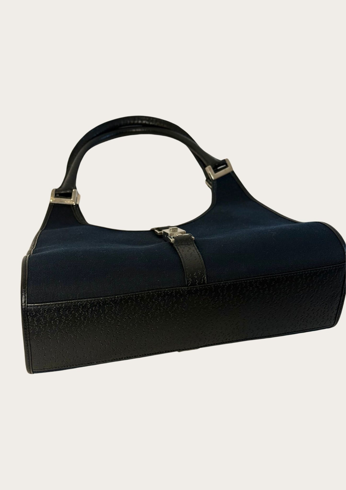 Bottom of Vintage black Gucci Jackie Bardot with leather details and silver colored hardware