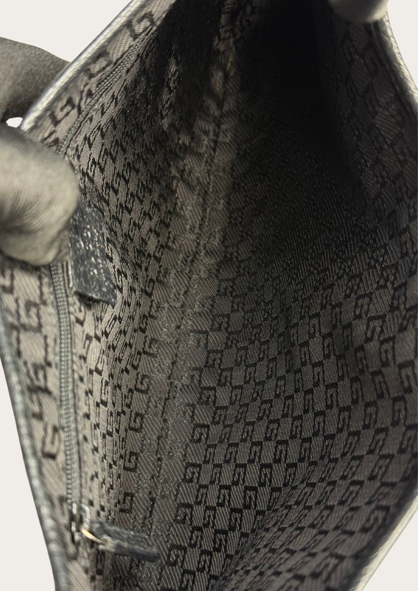 Inside of Genuine and pre-loved Gucci Jackie Bamboo handle bag in black