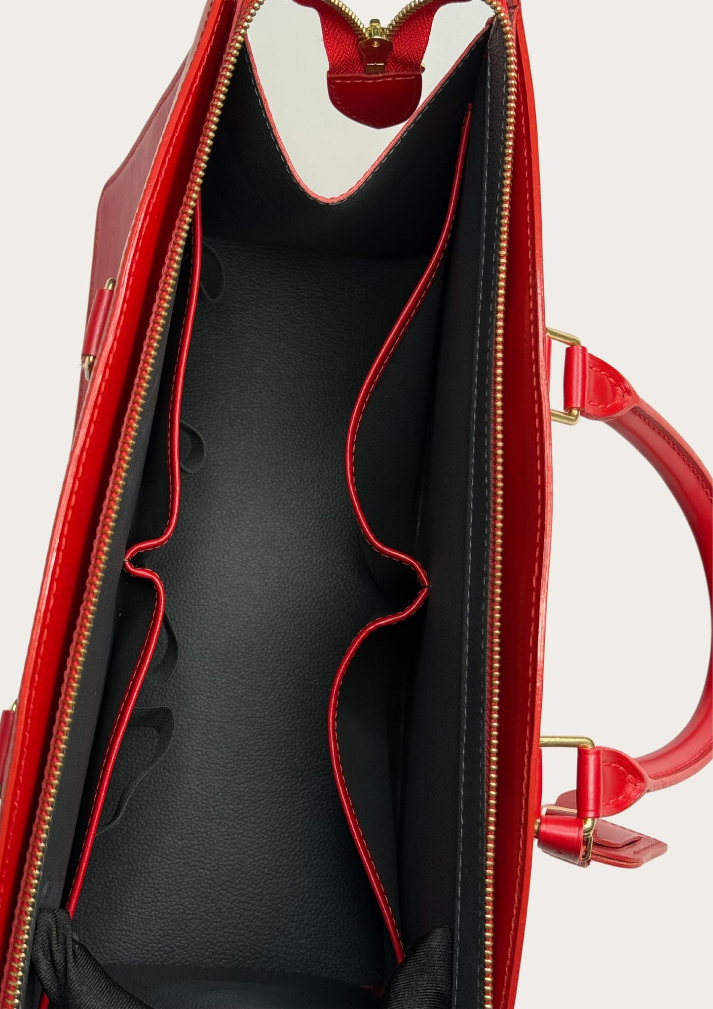 Inside of Classic Louis Vuitton Riviera bag in red api leather, authentic and vintage