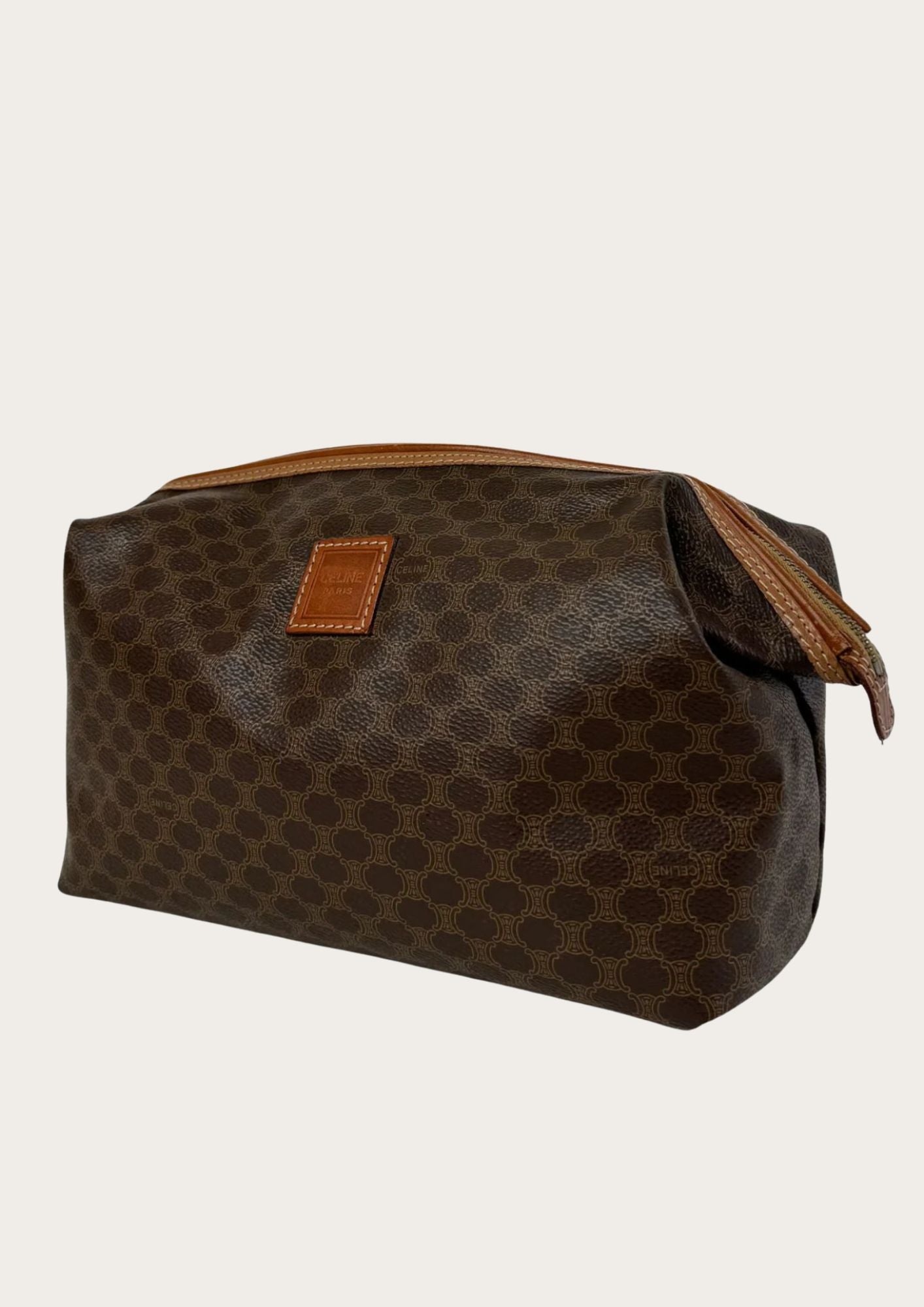 Authentic Celine toiletry case in brown macadam PVC leather, side.