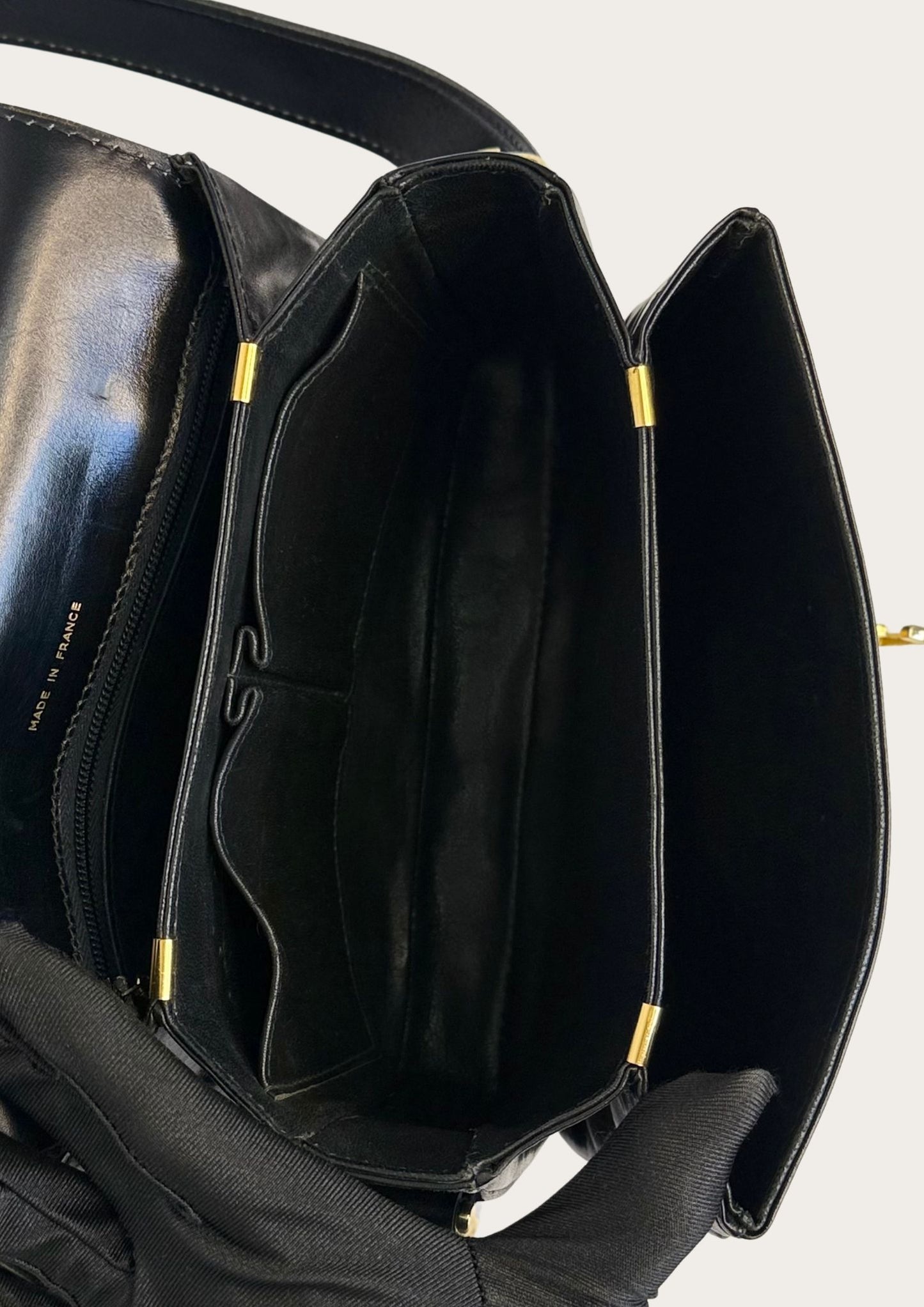 Vintage and authentic Celine horse carriage crossbody bag in black leather