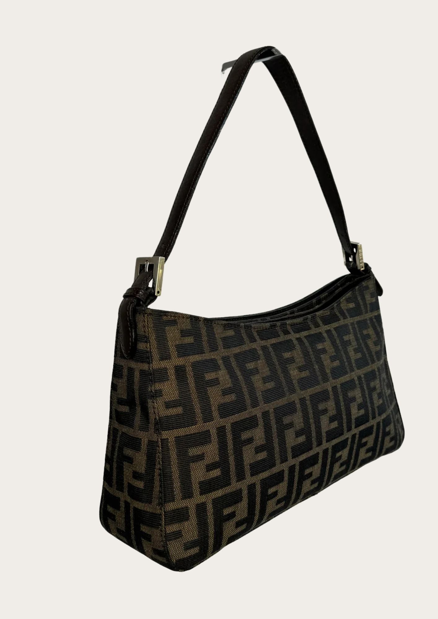 Pre-loved Fendi Zucca shoulder bag in brown with brown leather details, side.