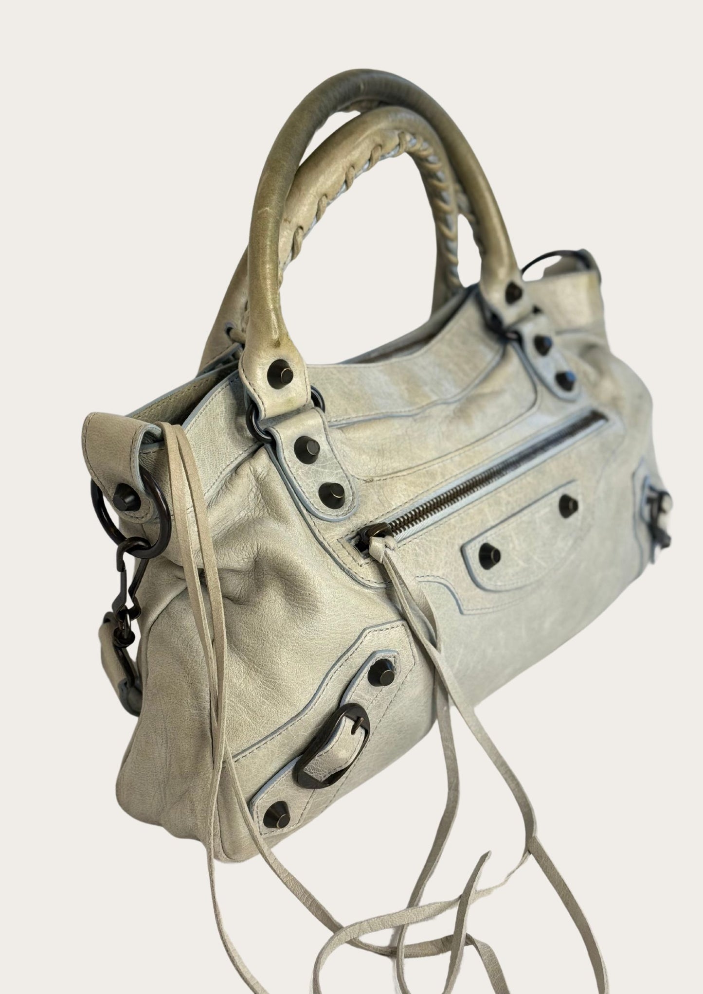 Side of Authentic and pre-owned Balenciaga City Bag in light blue