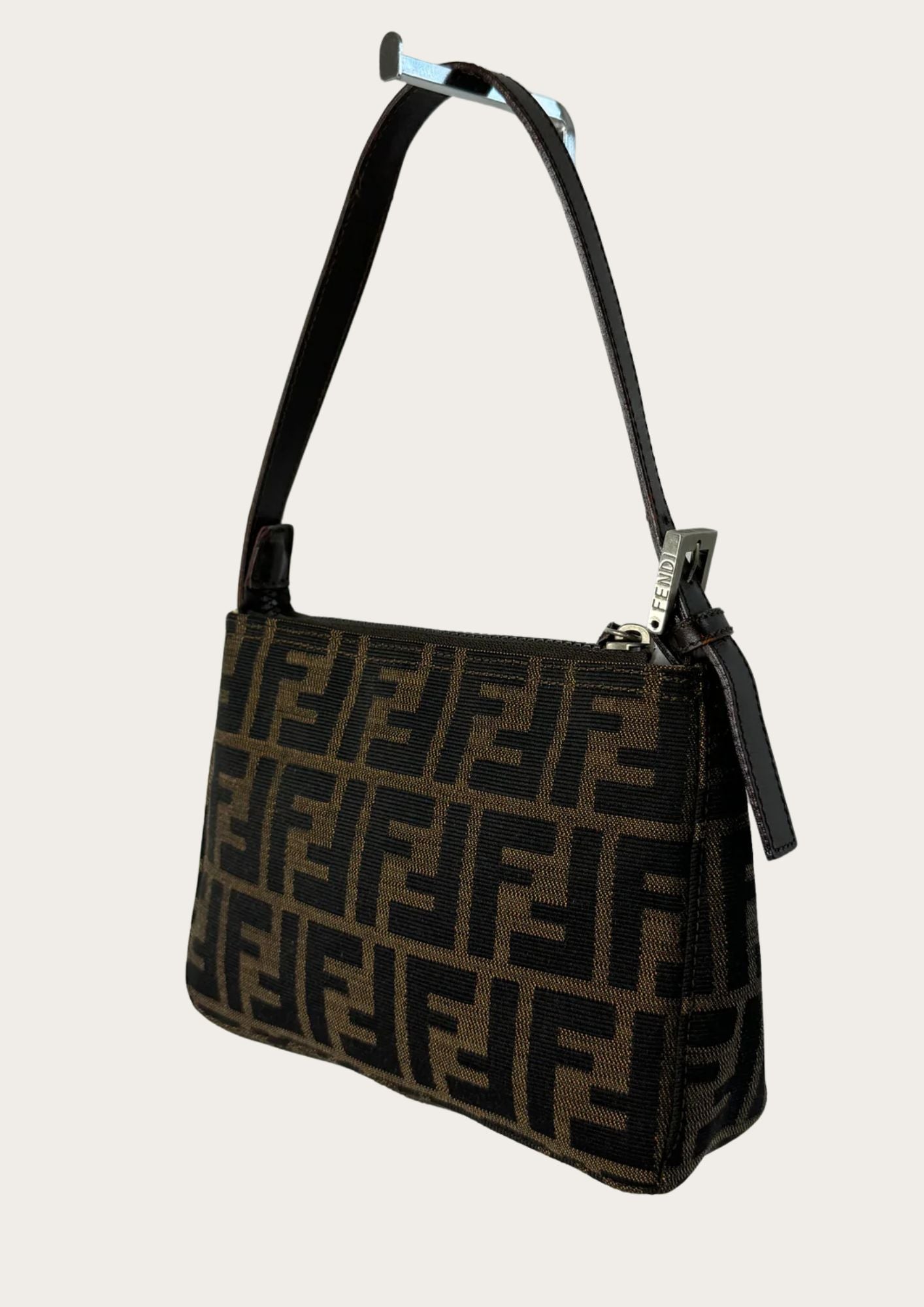 Pre-loved Fendi mini bag in Zucca pattern, brown. Side.