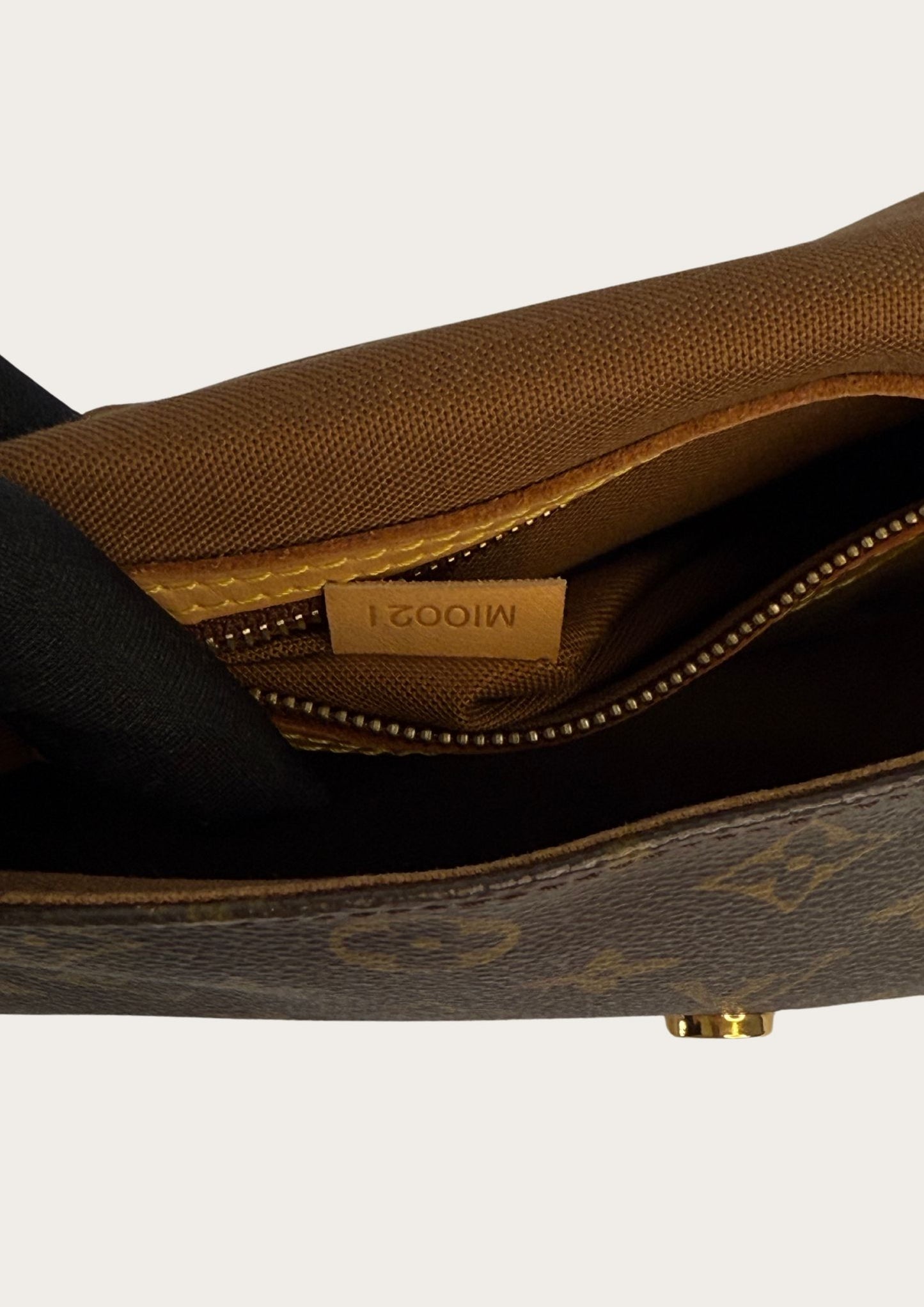 Authenticity code of Vintage Louis Vuitton Mini Looping bag in monogram leather