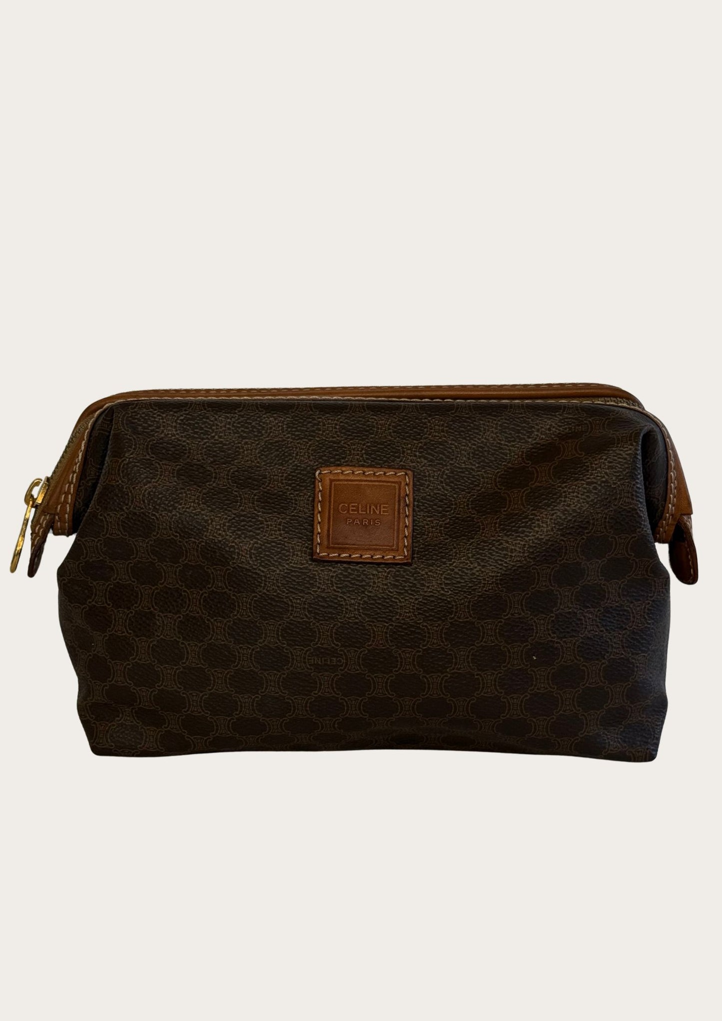 Front of Celine toiletry bag in macadam, brown leather