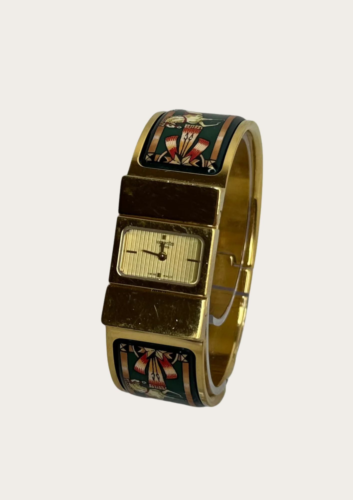 100% authentic slassic Hermès Loquet watch in model LO1.210, enamel with gold details.