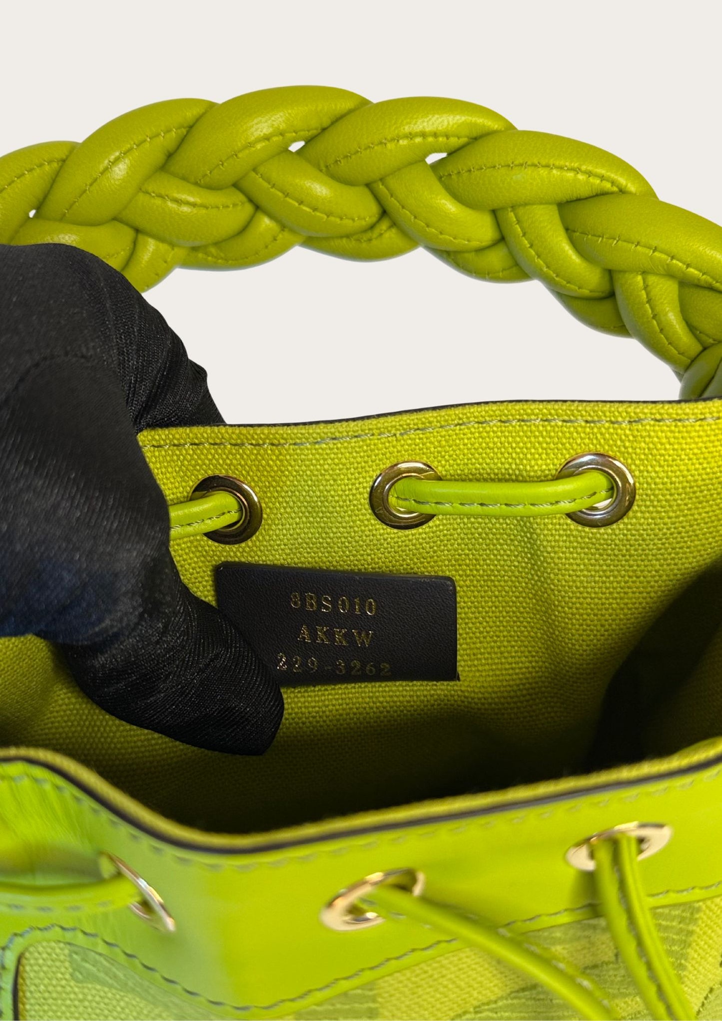 Authentic Fendi Mon Trésor Mini Bucket Bag in green canvas with leather details