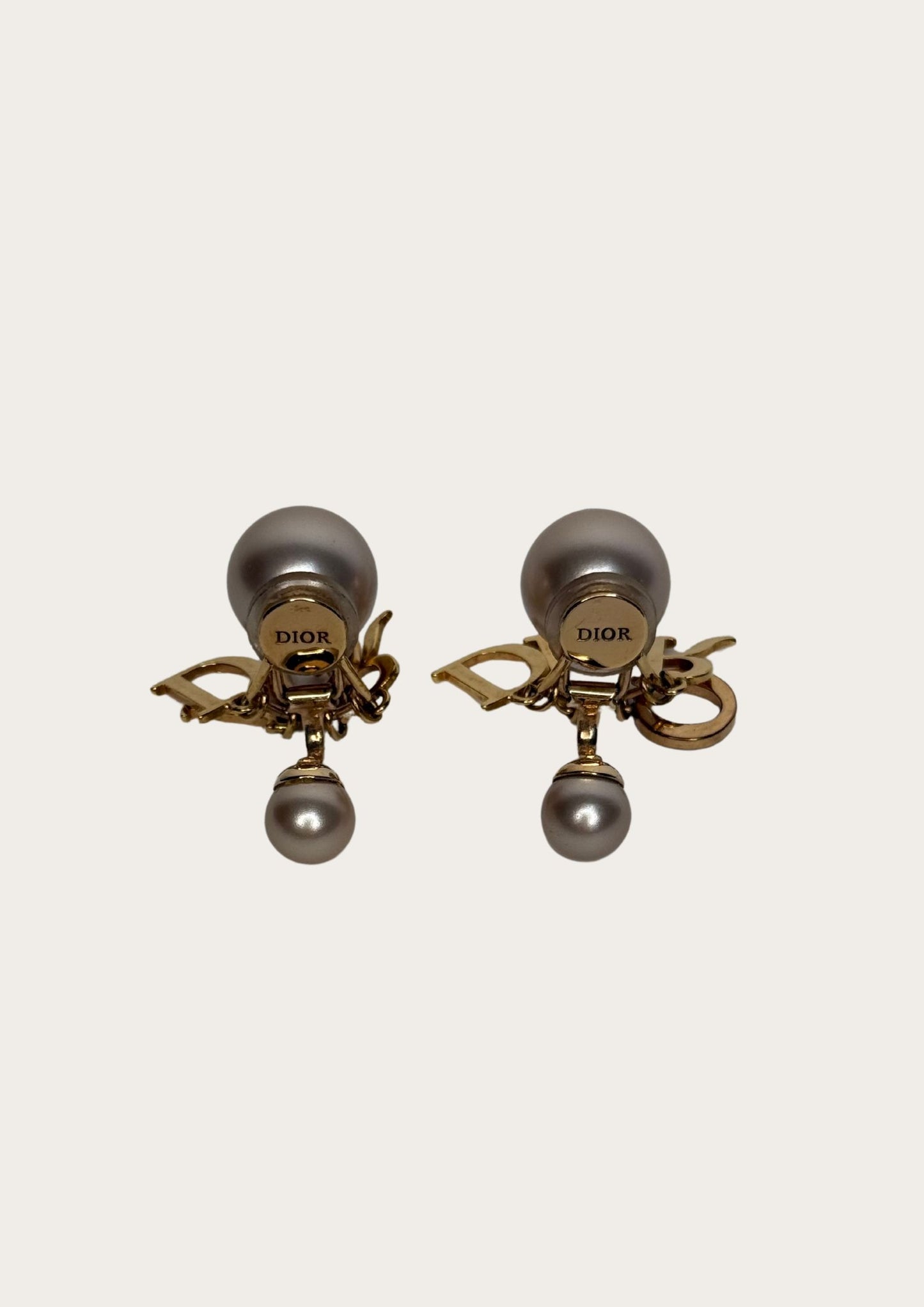 Details of logo Pre-loved Dior tribal earrings in rose gold with diamond details