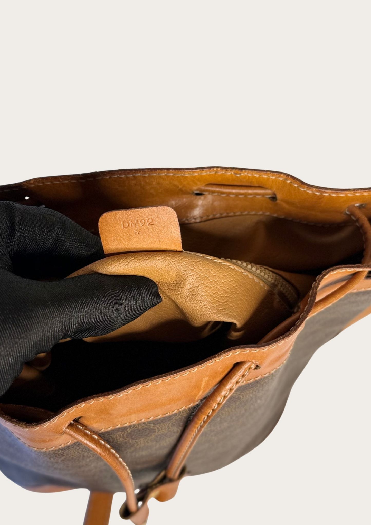 Genuine Celine bucket bag in macadam pattern with leather details