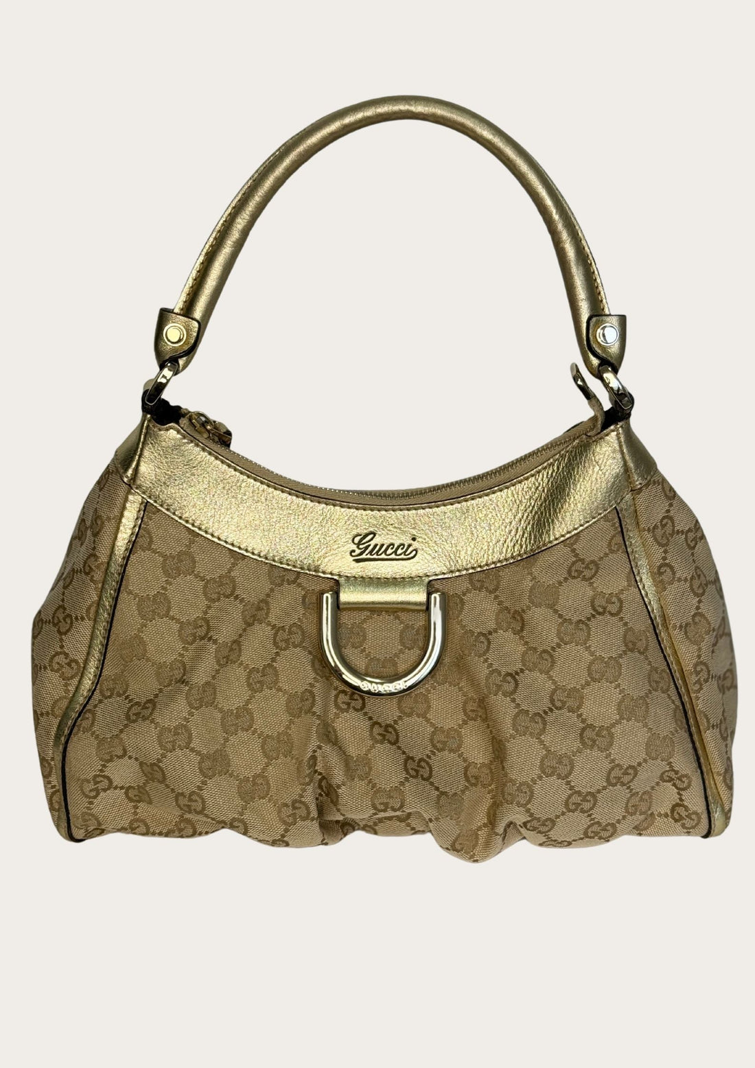 Gucci Abbey D-ring bag in GG pattern with metallic details