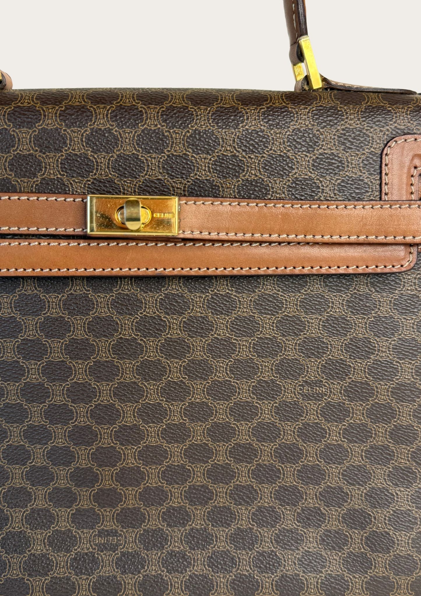 Authentic and vintage Celine top handle bag in macadam pattern