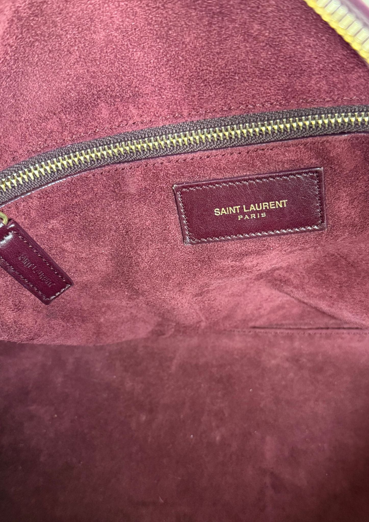 Authentic Saint Laurent Duffle bag (medium) in burgundy red