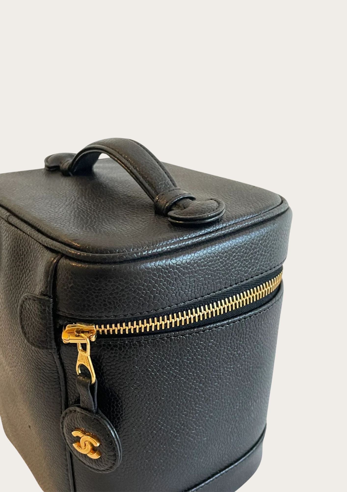 On top phot of  Chanel CC Caviar Vanity case 