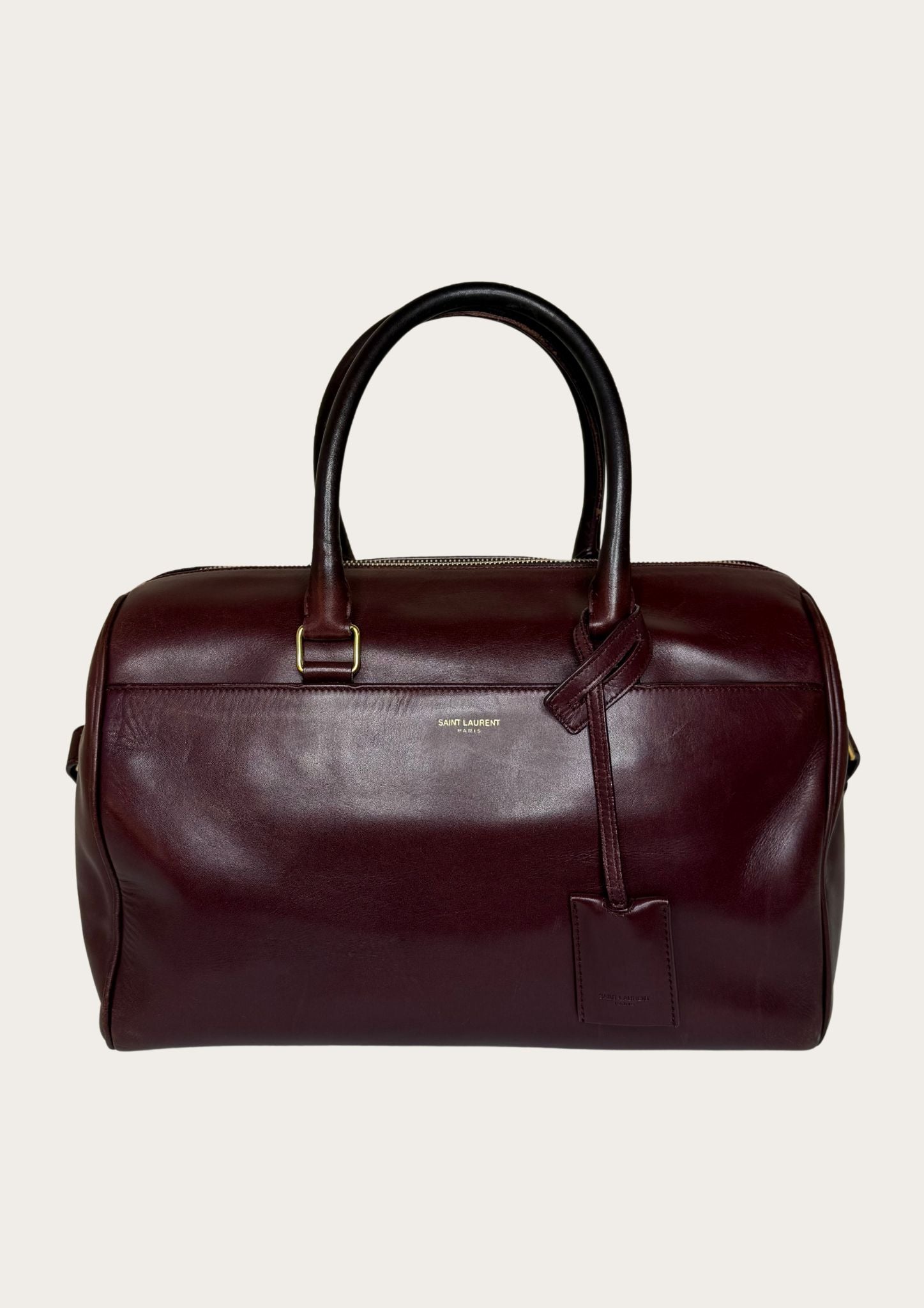 Authentic Saint Laurent Duffle bag (medium) in burgundy red
