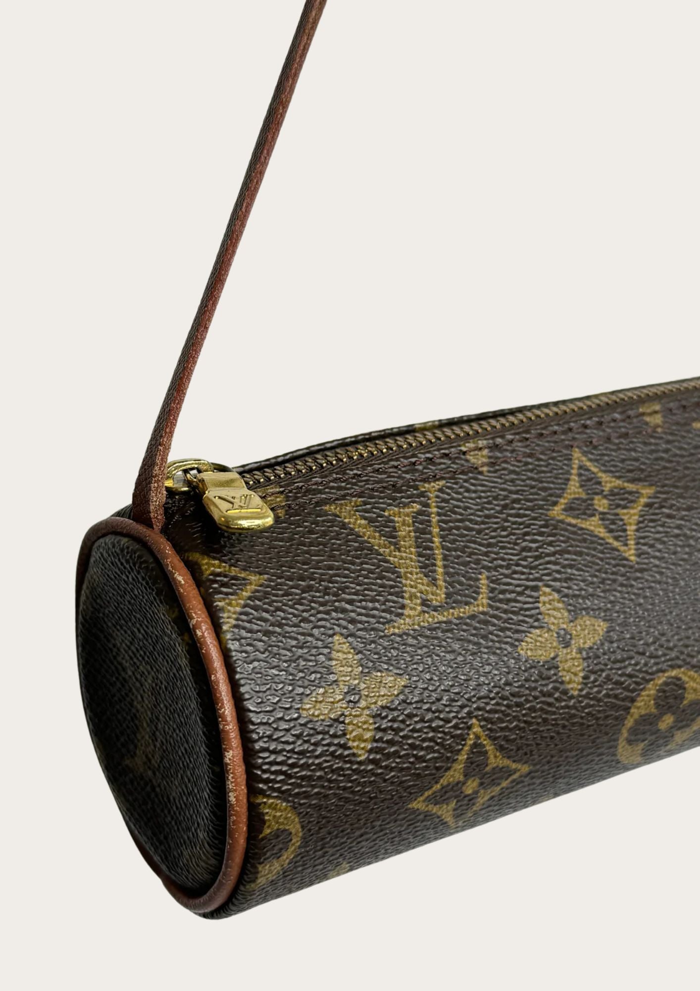 Detail picture of Louis Vuitton mini Papillon pouch in monogram, brown.