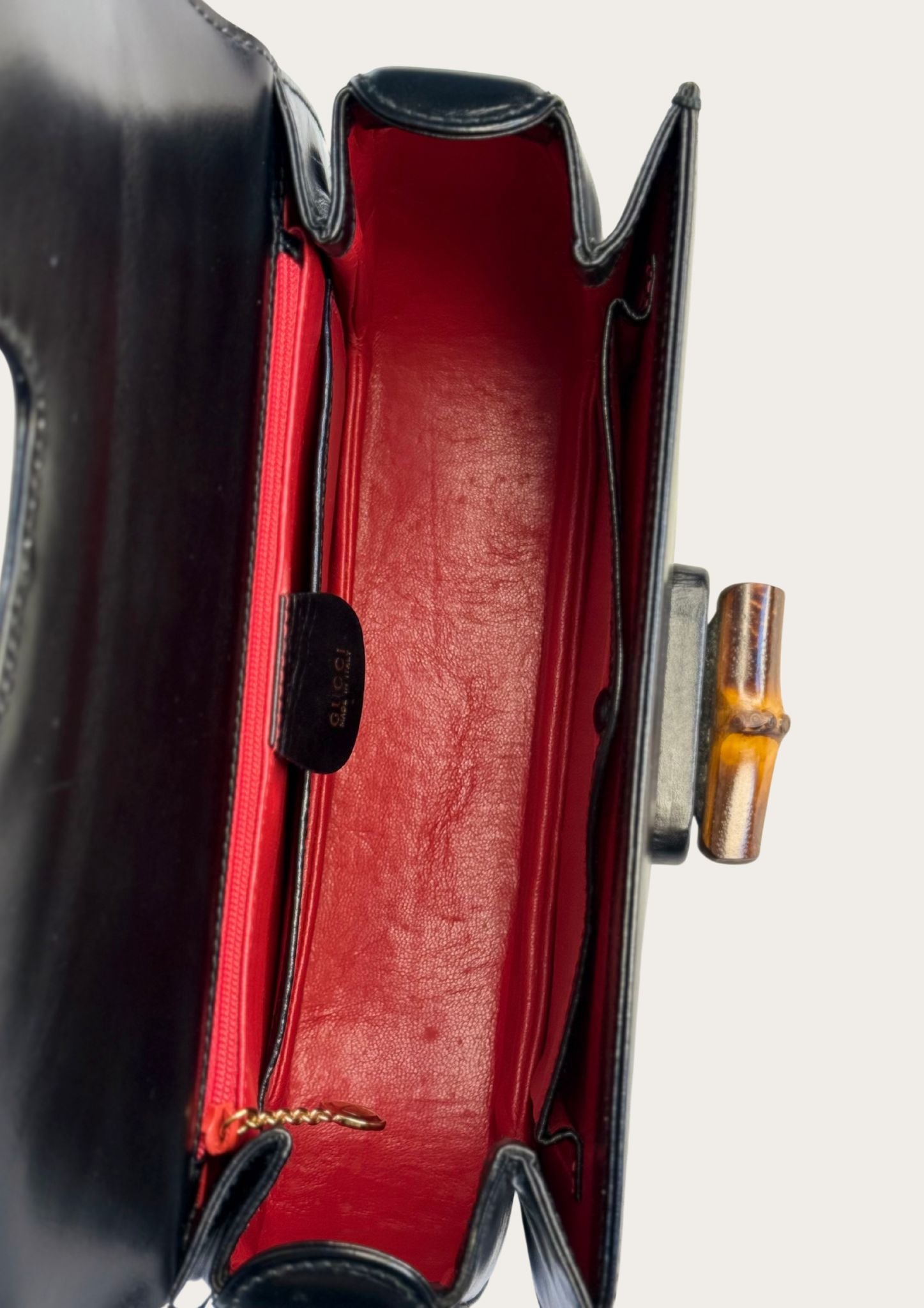 Authentic Gucci bamboo convertible in black leather and gold colored hardware