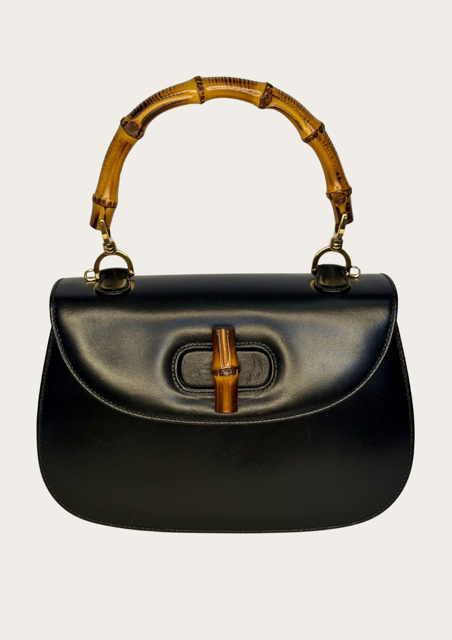 Authentic Gucci bamboo convertible in black leather and gold colored hardware