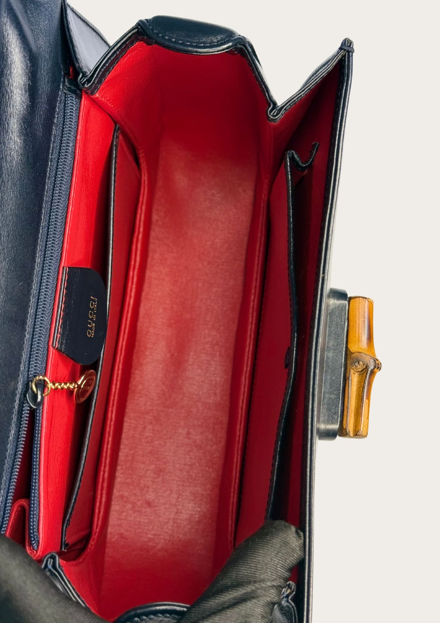 Vintage and authentic Gucci Bamboo Convertible Top Handle Bag in black leather