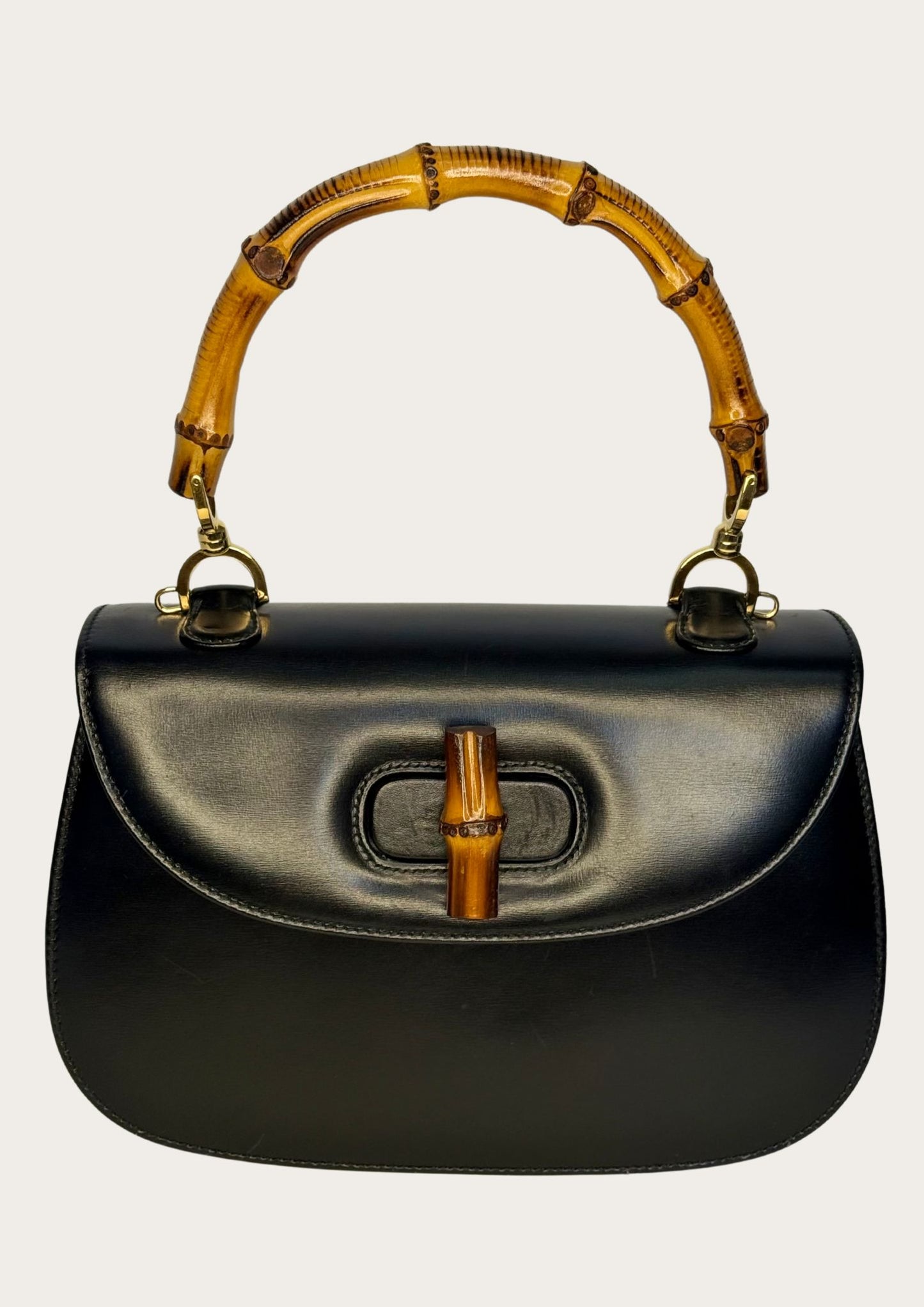 Authentic Gucci bamboo convertible in black leather and gold colored hardware