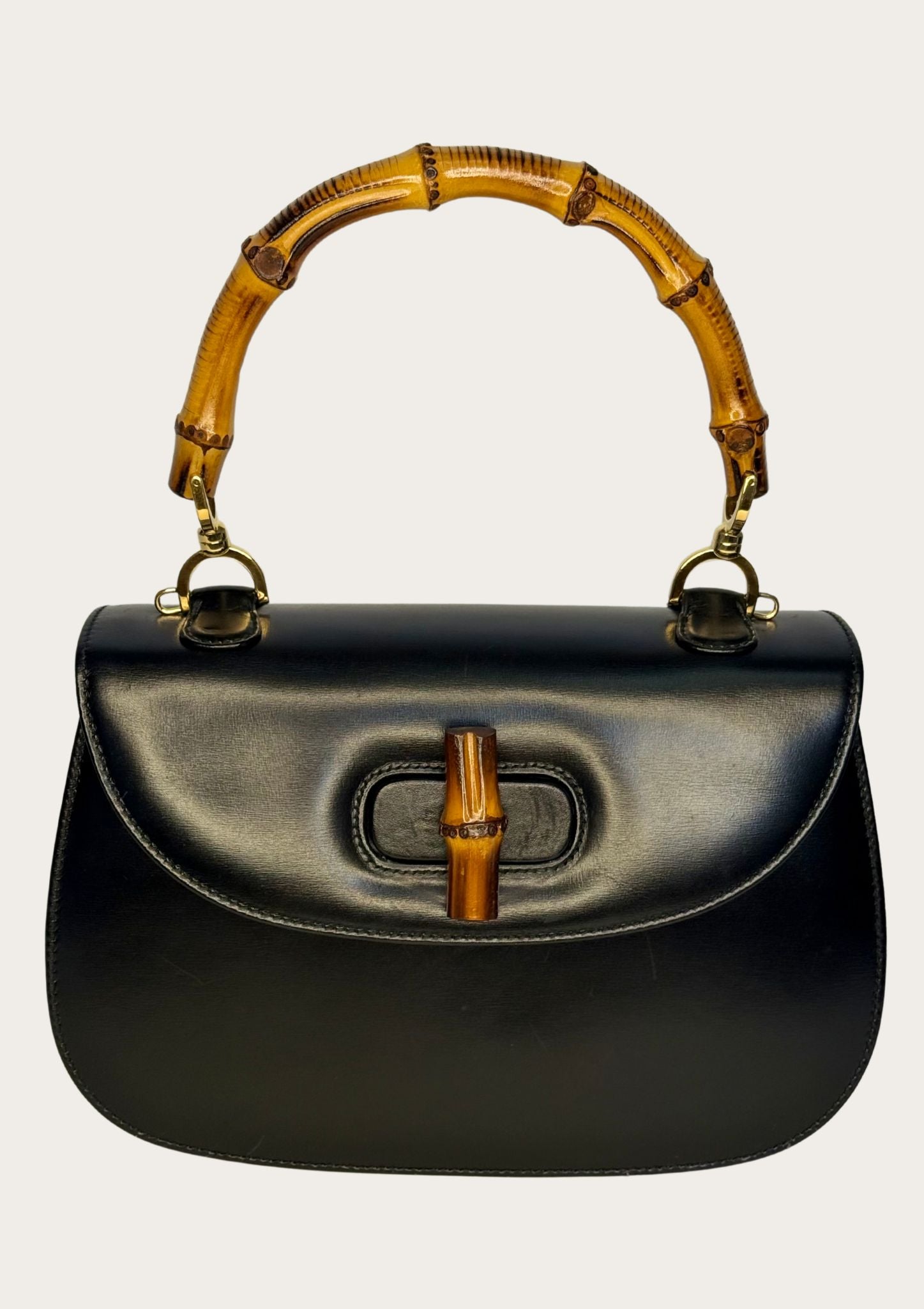 Authentic Gucci bamboo convertible in black leather and gold colored hardware