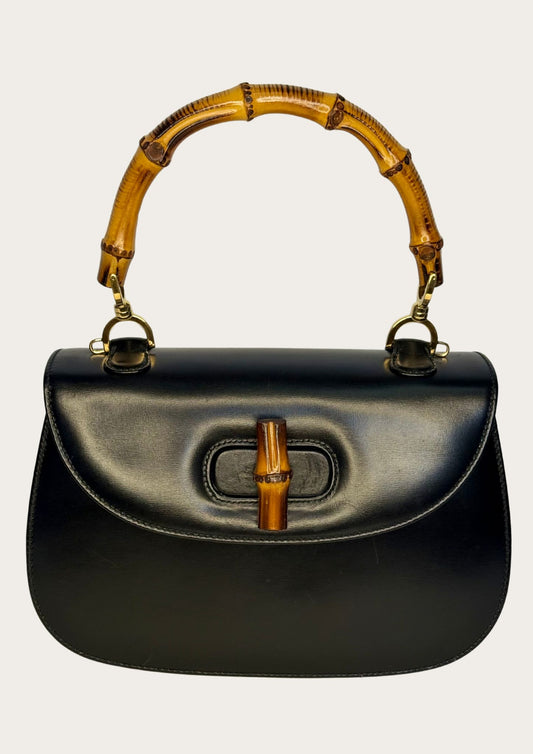 Authentic Gucci bamboo convertible in black leather and gold colored hardware