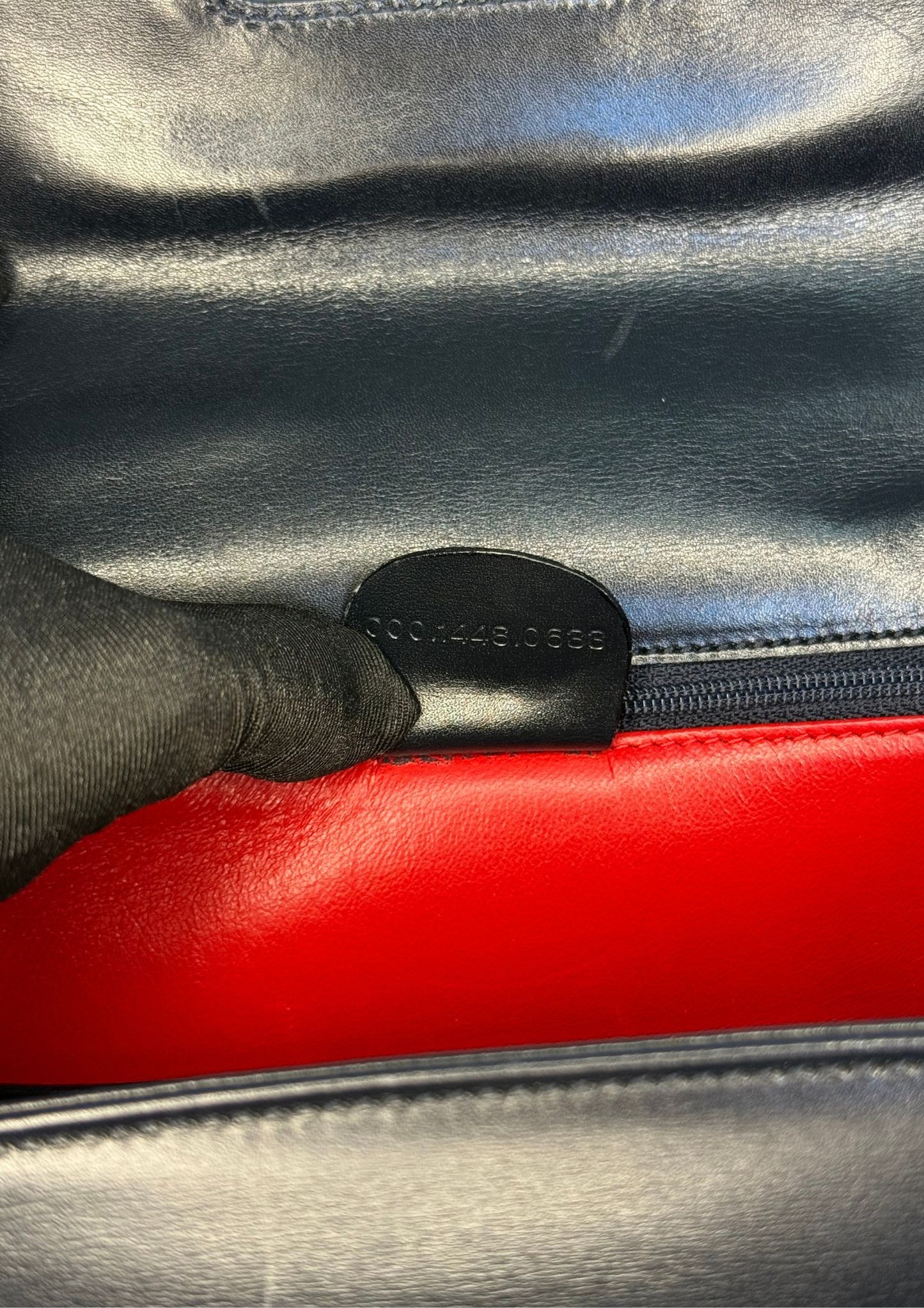 Vintage and authentic Gucci Bamboo Convertible Top Handle Bag in black leather