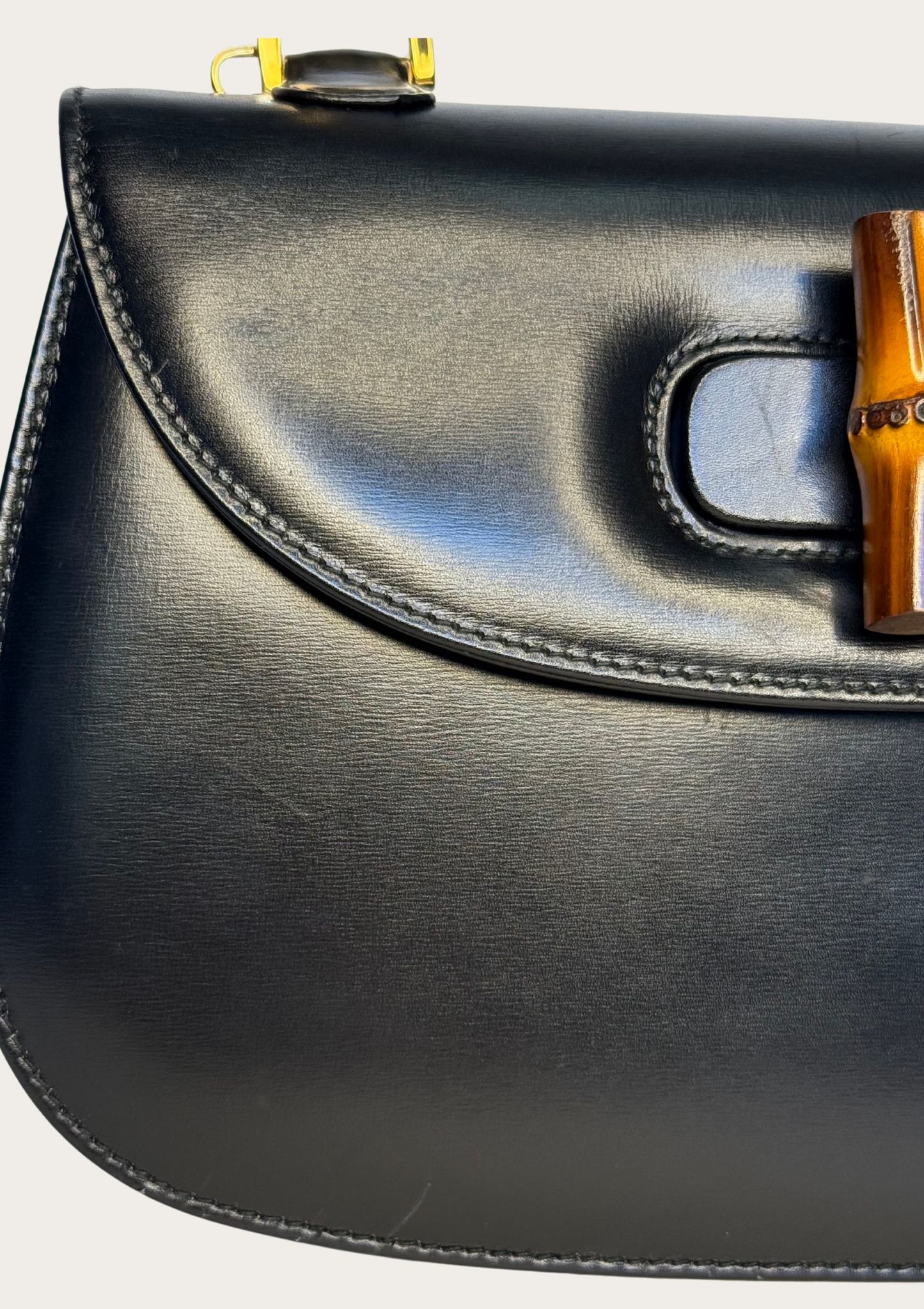 Authentic Gucci bamboo convertible in black leather and gold colored hardware