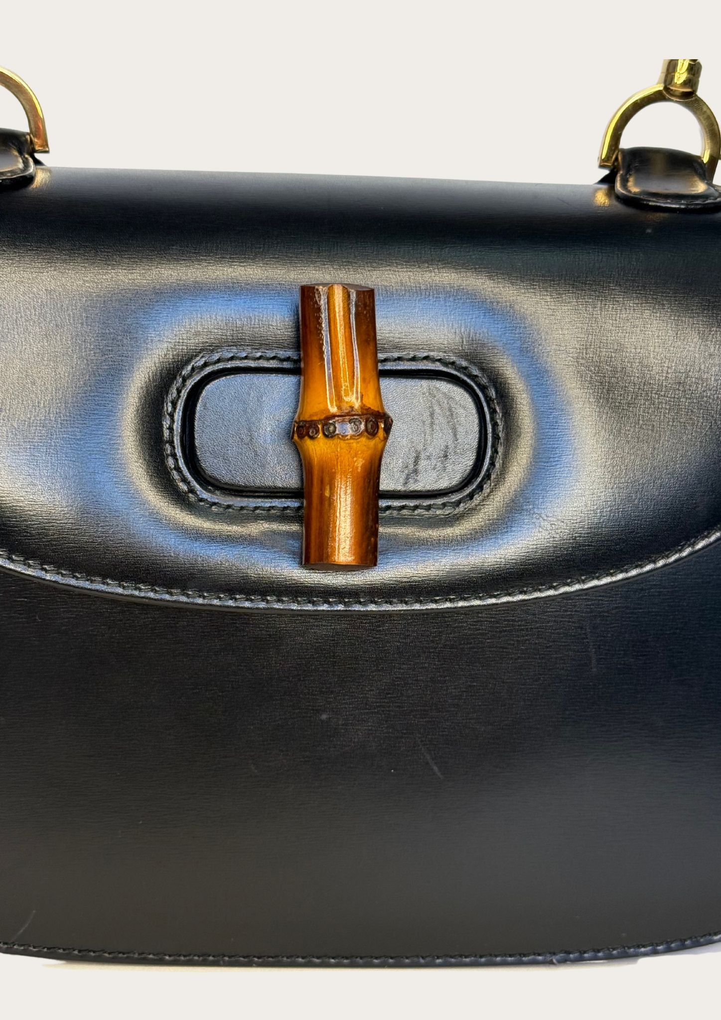 Authentic Gucci bamboo convertible in black leather and gold colored hardware
