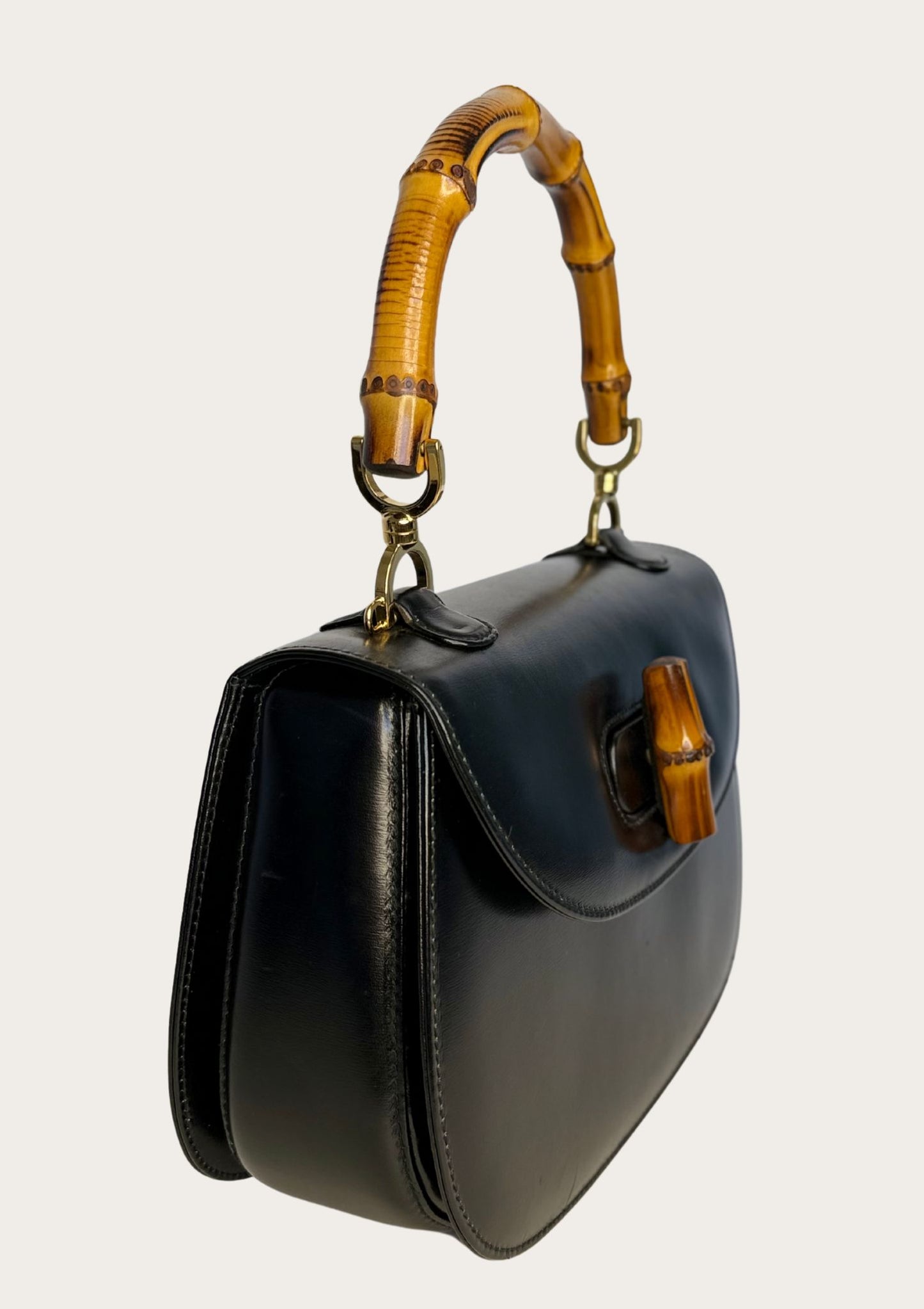 Authentic Gucci bamboo convertible in black leather and gold colored hardware