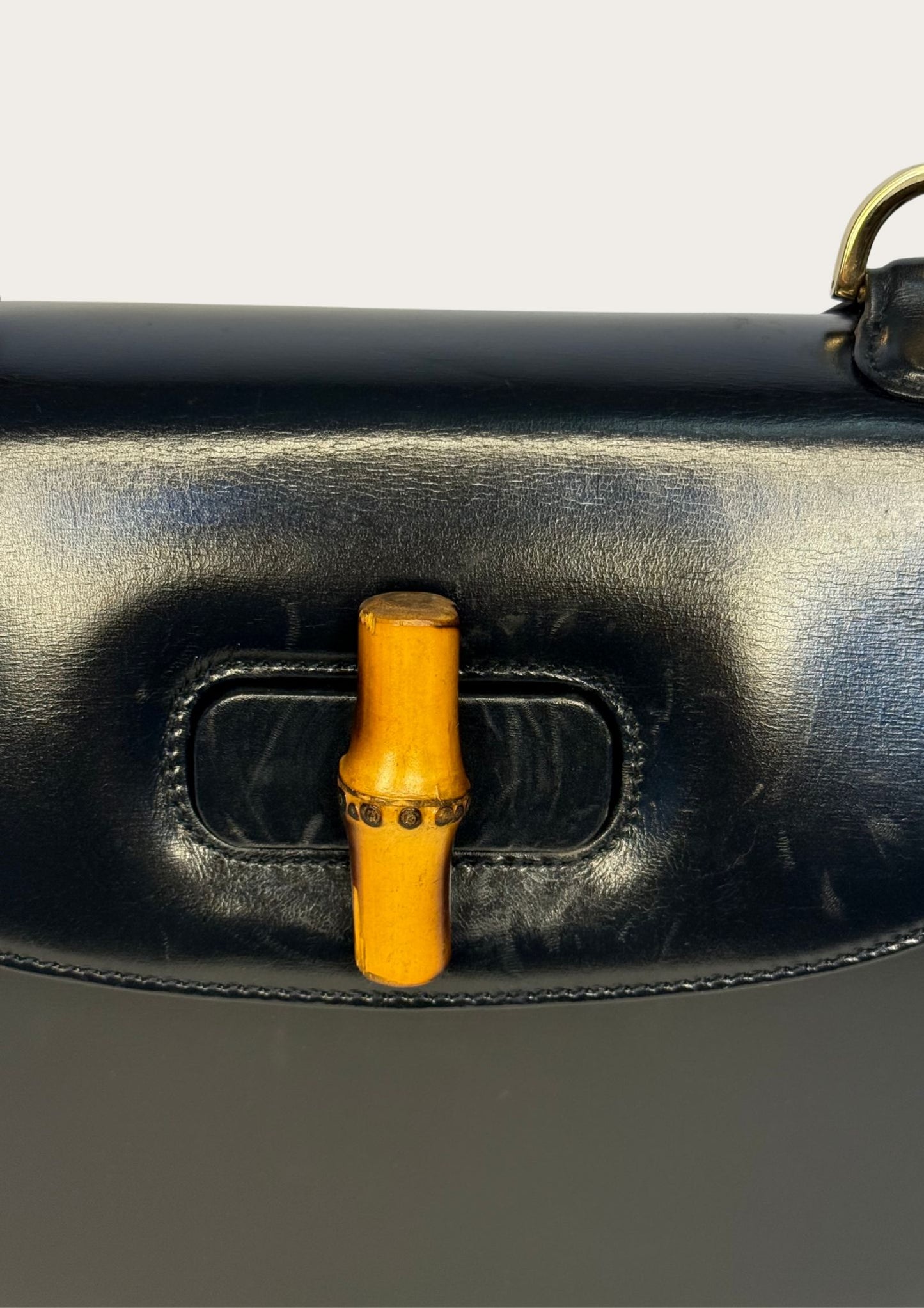 Vintage and authentic Gucci Bamboo Convertible Top Handle Bag in black leather