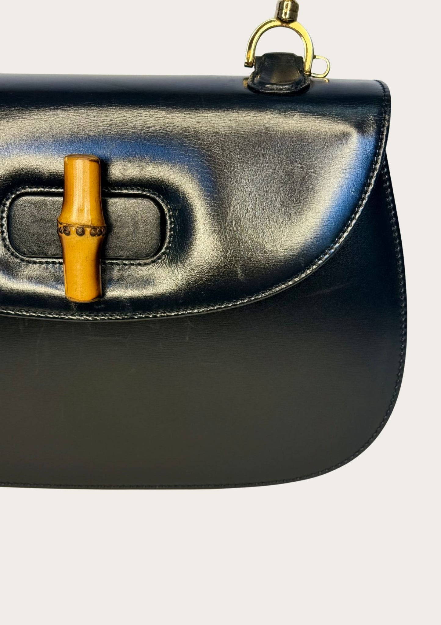 Vintage and authentic Gucci Bamboo Convertible Top Handle Bag in black leather