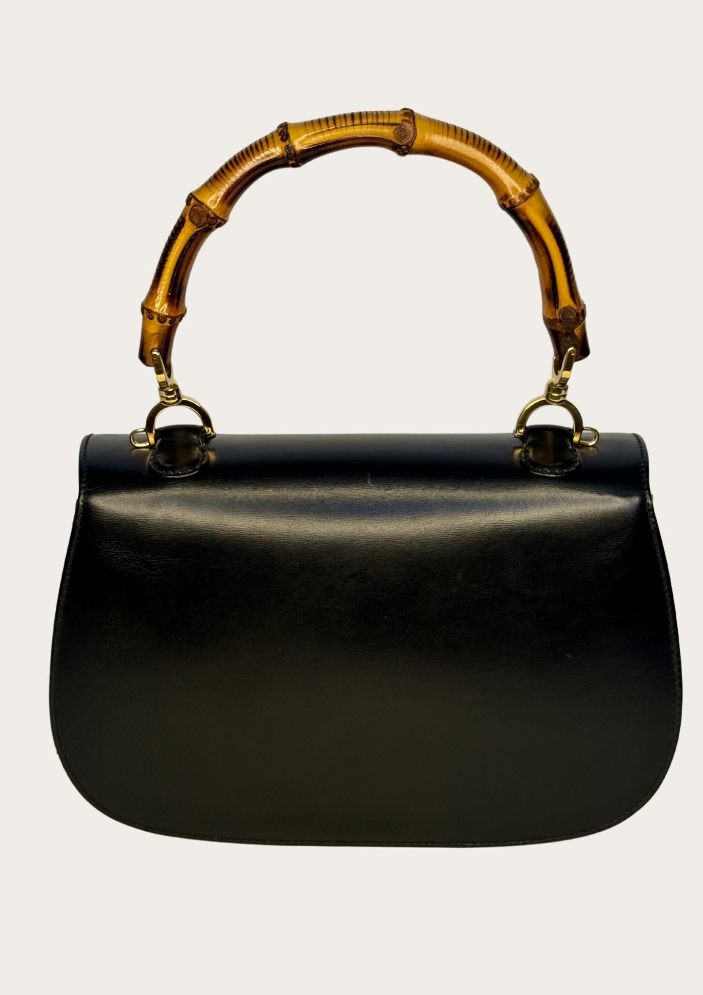Authentic Gucci bamboo convertible in black leather and gold colored hardware