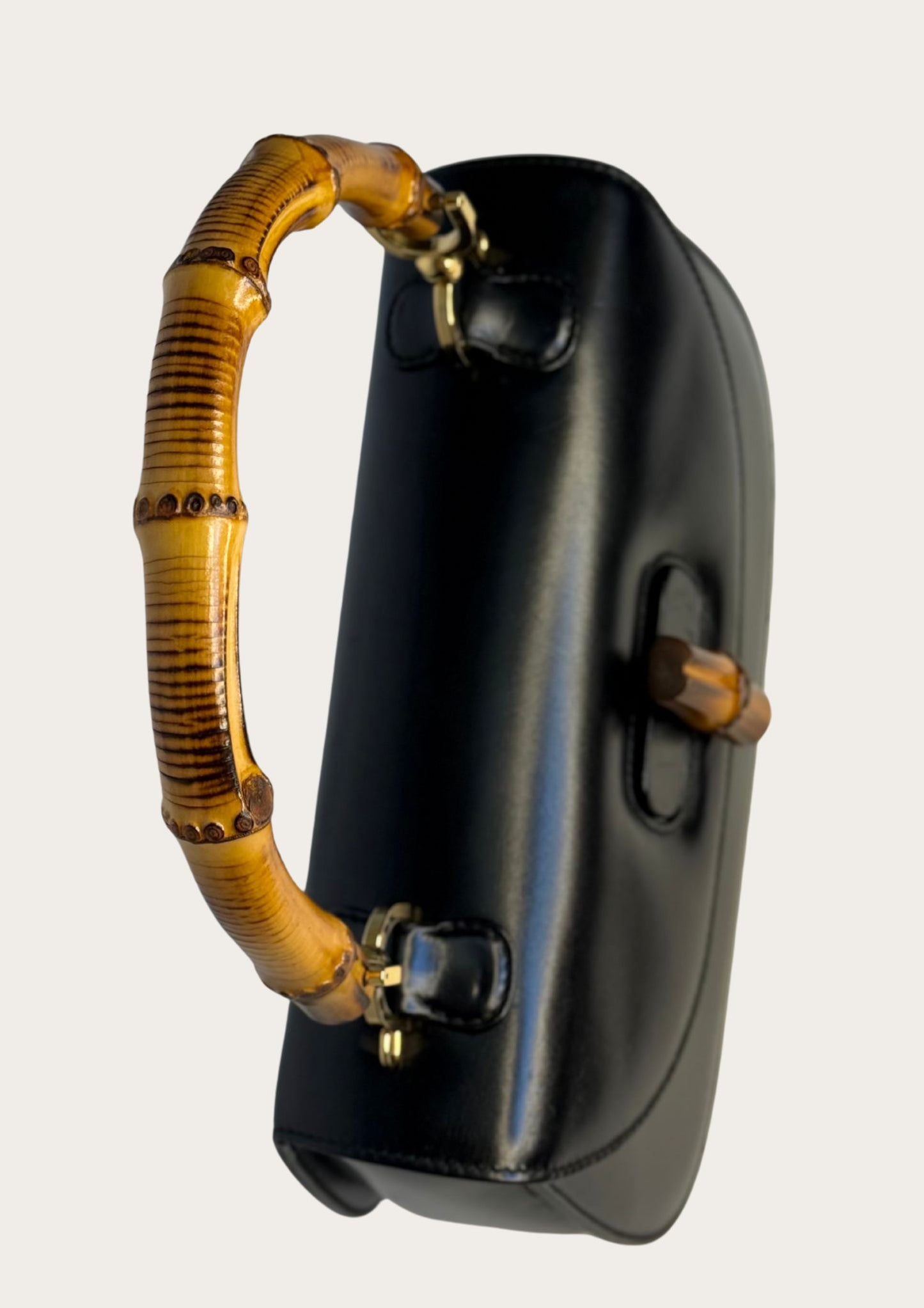 Authentic Gucci bamboo convertible in black leather and gold colored hardware