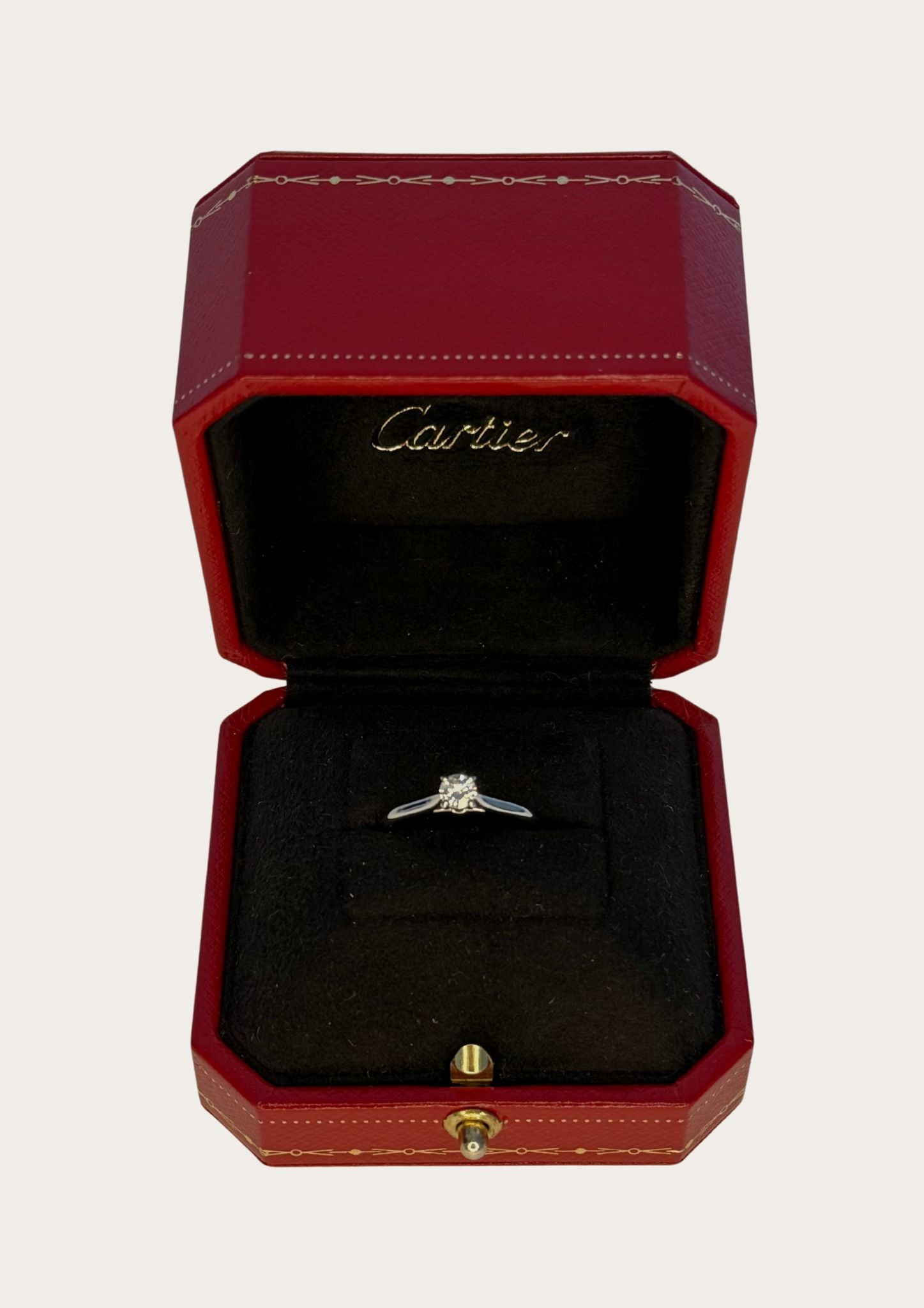 Authentic Cartier Solitaire 1895 diamond ring in platinum with case and certificate.