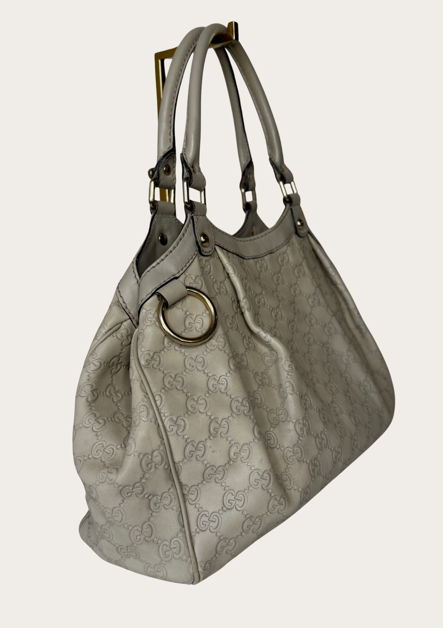 Authentic Gucci Sukey medium bag in beige Guccissima leather