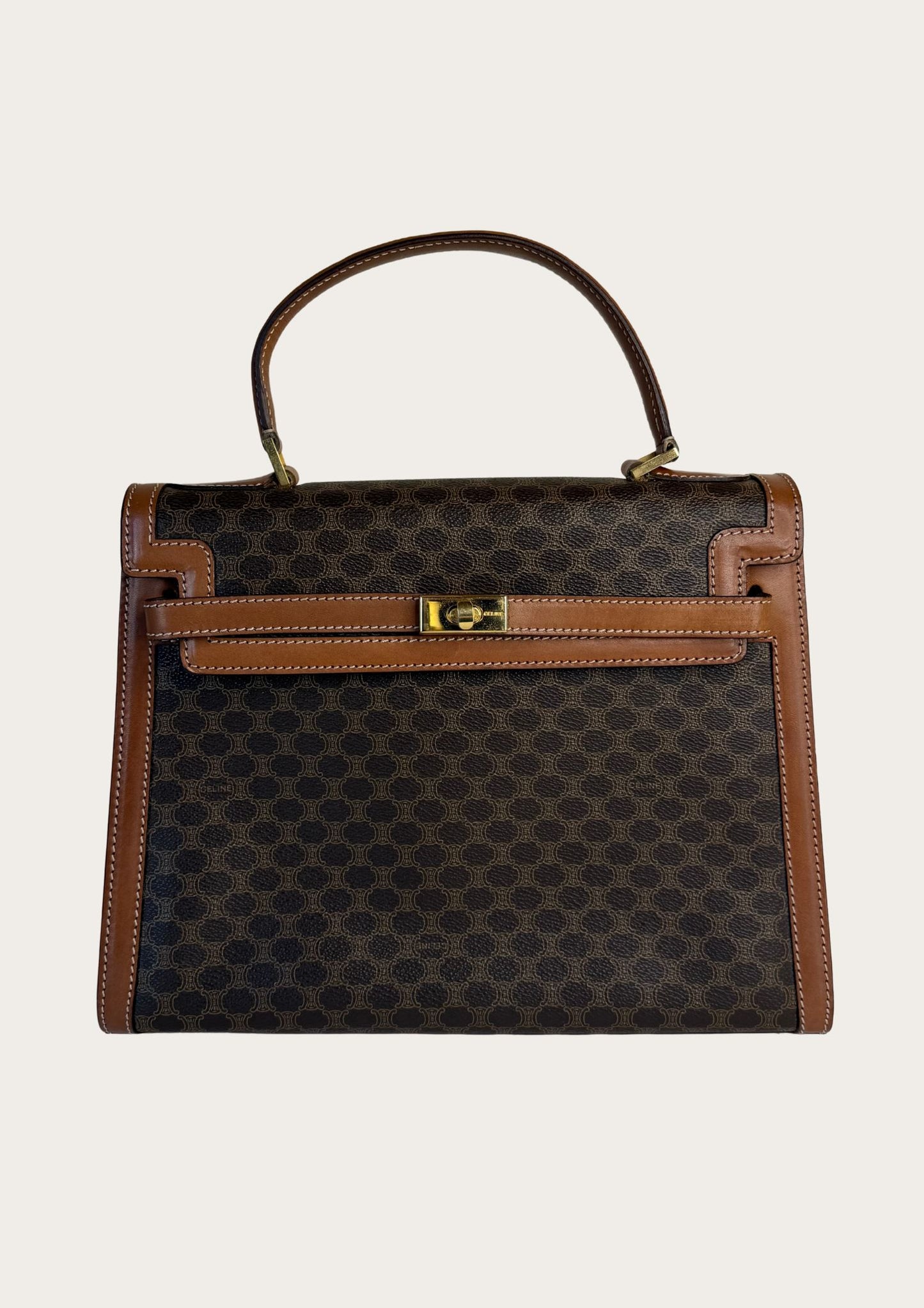 Authentic and vintage Celine top handle bag in macadam pattern