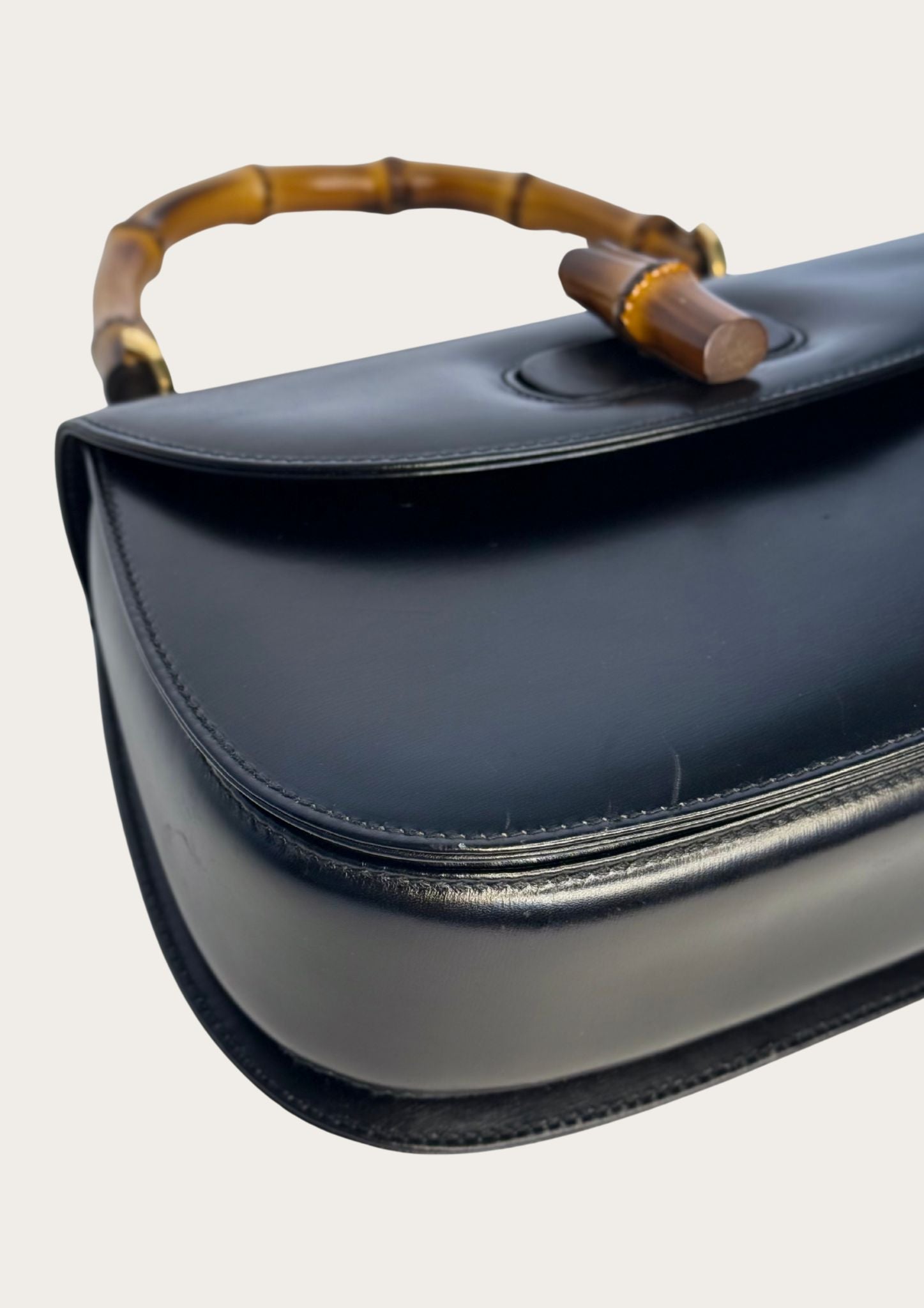 Authentic Gucci bamboo convertible in black leather and gold colored hardware