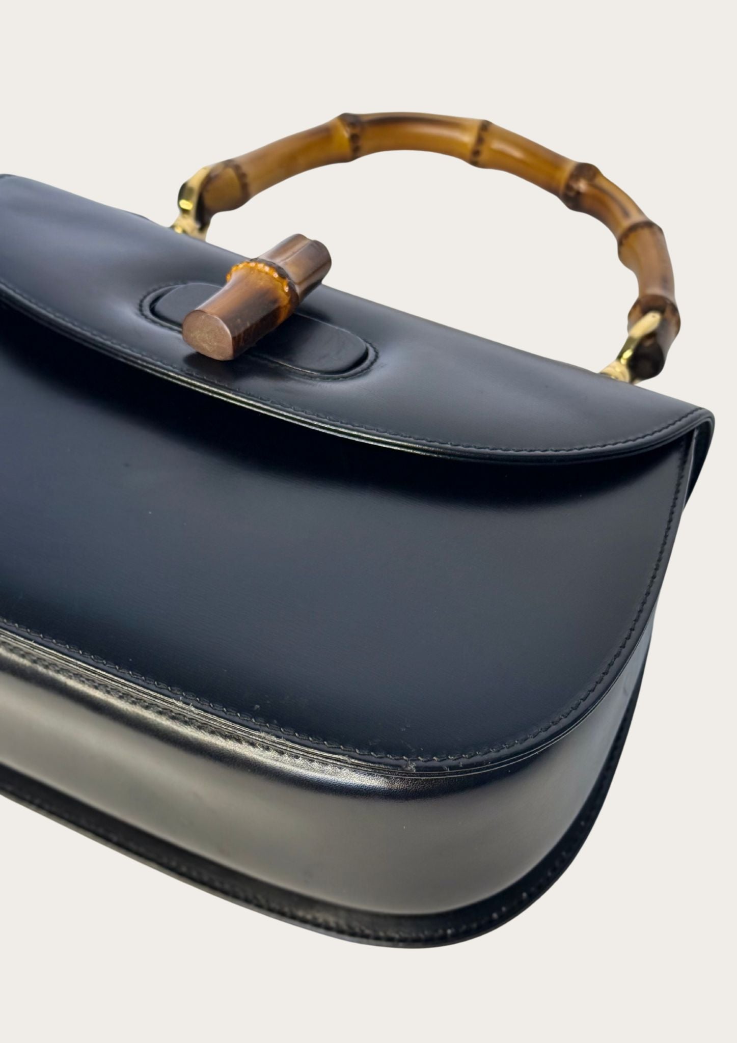 Authentic Gucci bamboo convertible in black leather and gold colored hardware