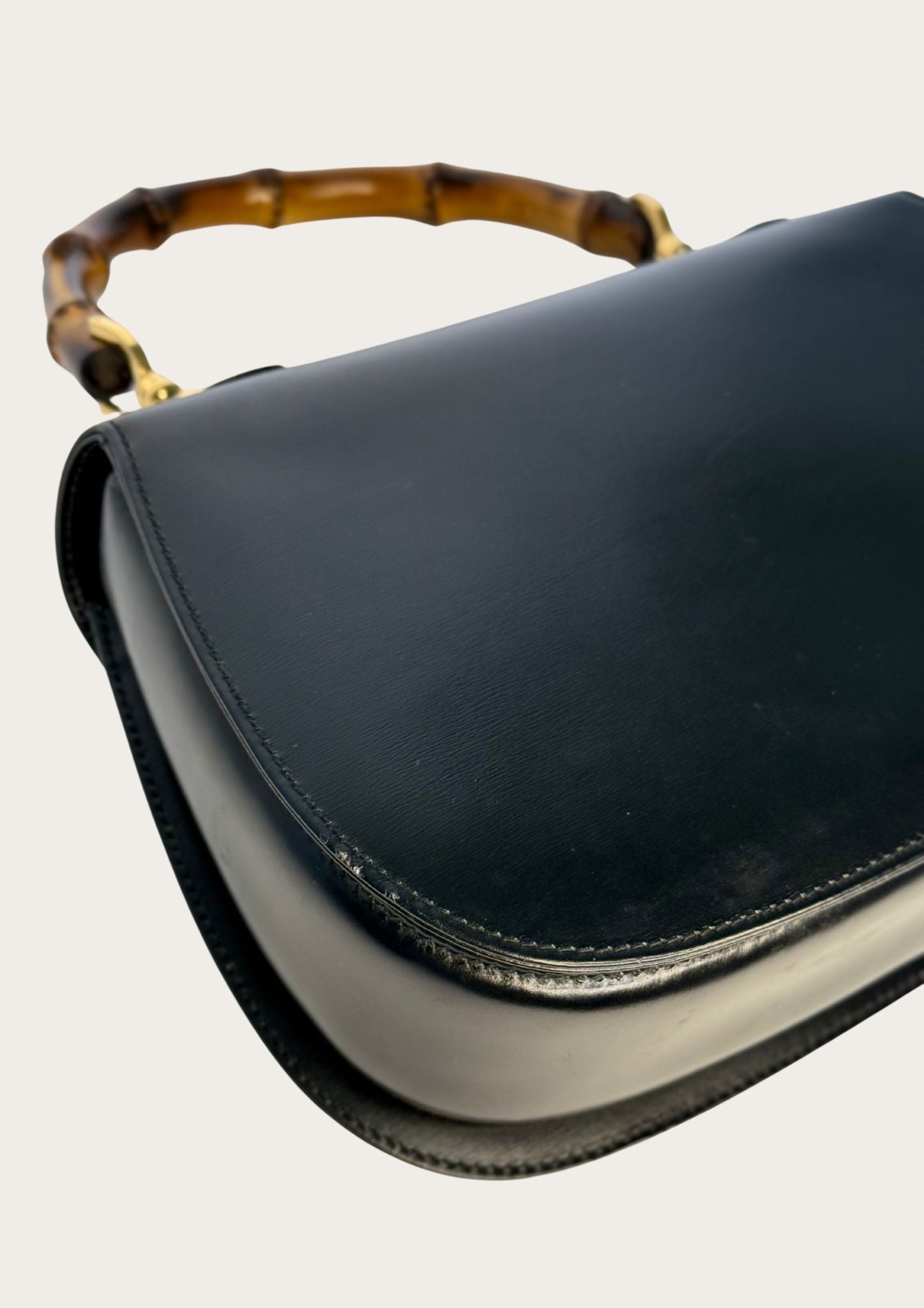 Authentic Gucci bamboo convertible in black leather and gold colored hardware