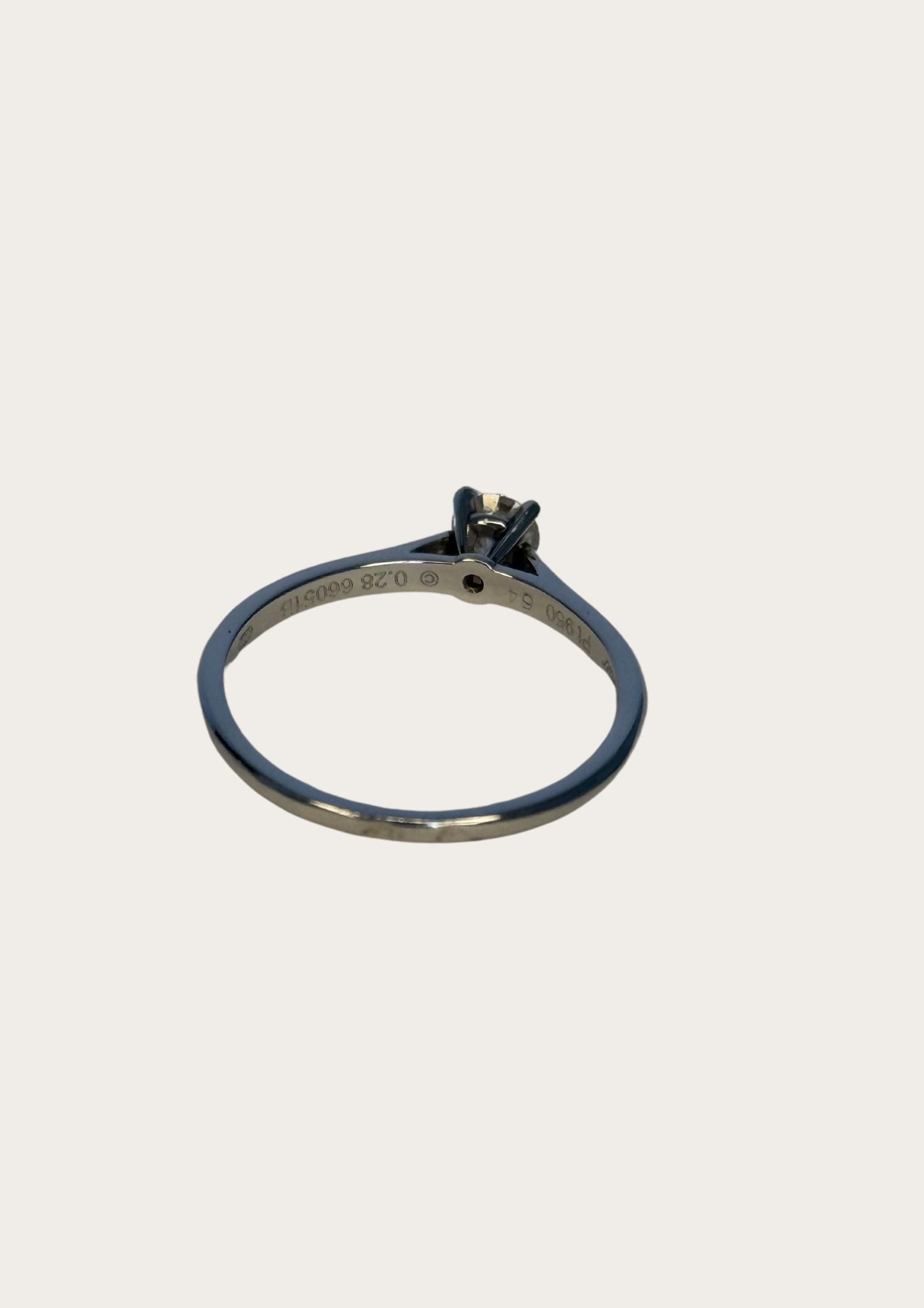 Authentic Cartier Solitaire 1895 diamond ring in platinum with case and certificate.