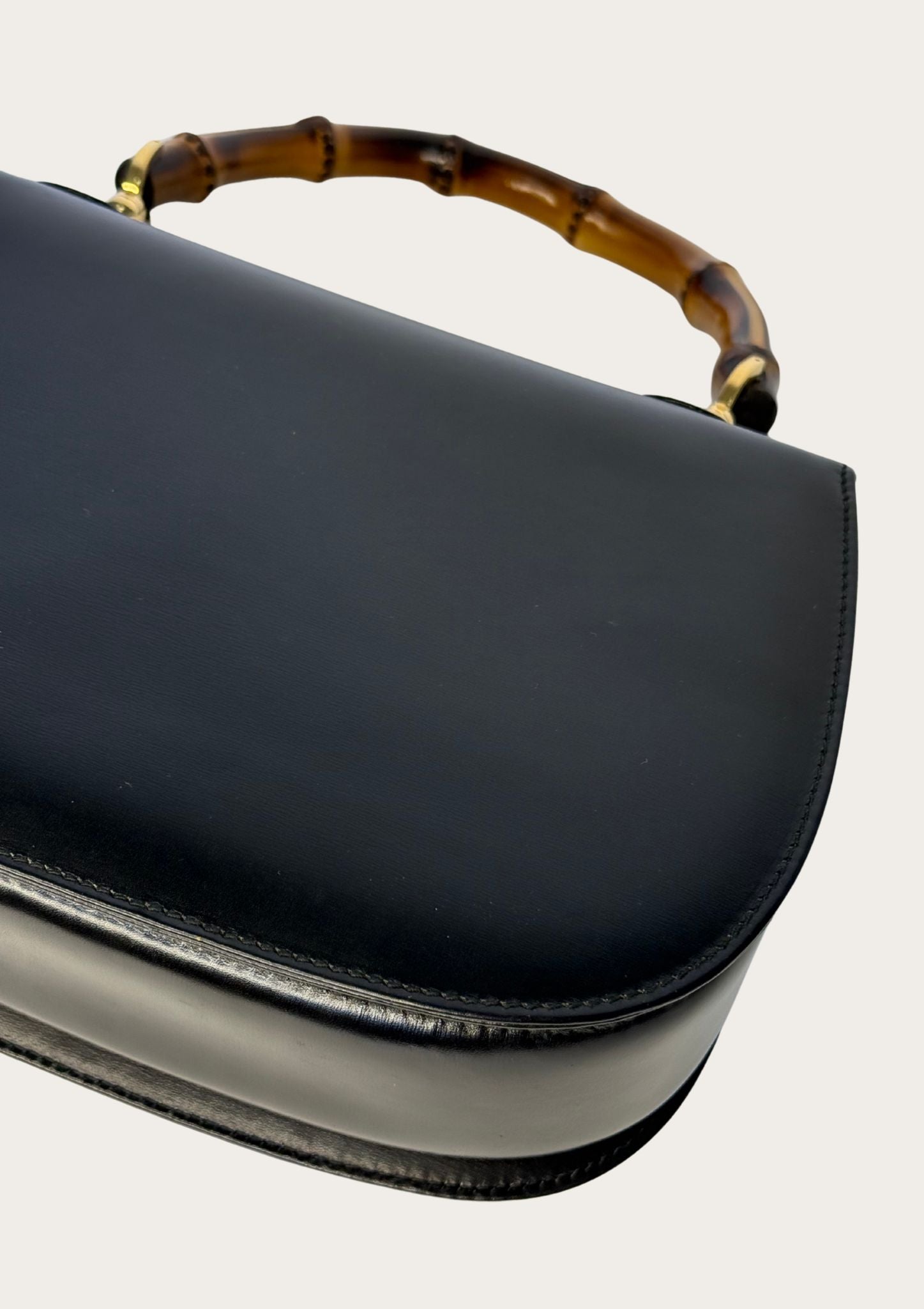 Authentic Gucci bamboo convertible in black leather and gold colored hardware