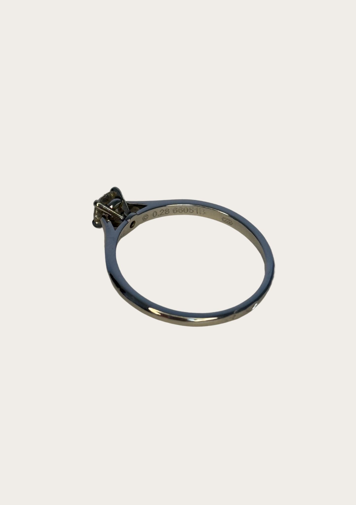 Authentic Cartier Solitaire 1895 diamond ring in platinum with case and certificate.