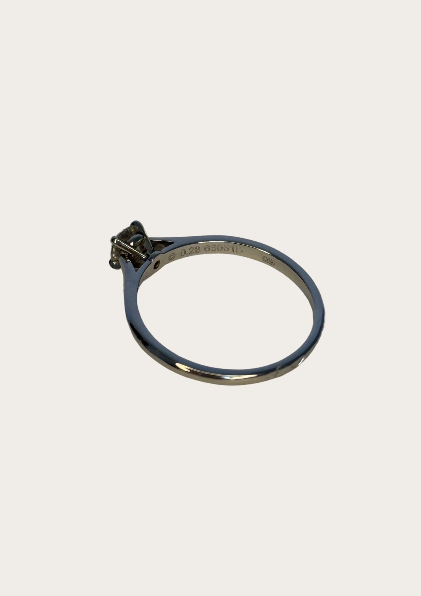 Authentic Cartier Solitaire 1895 diamond ring in platinum with case and certificate.