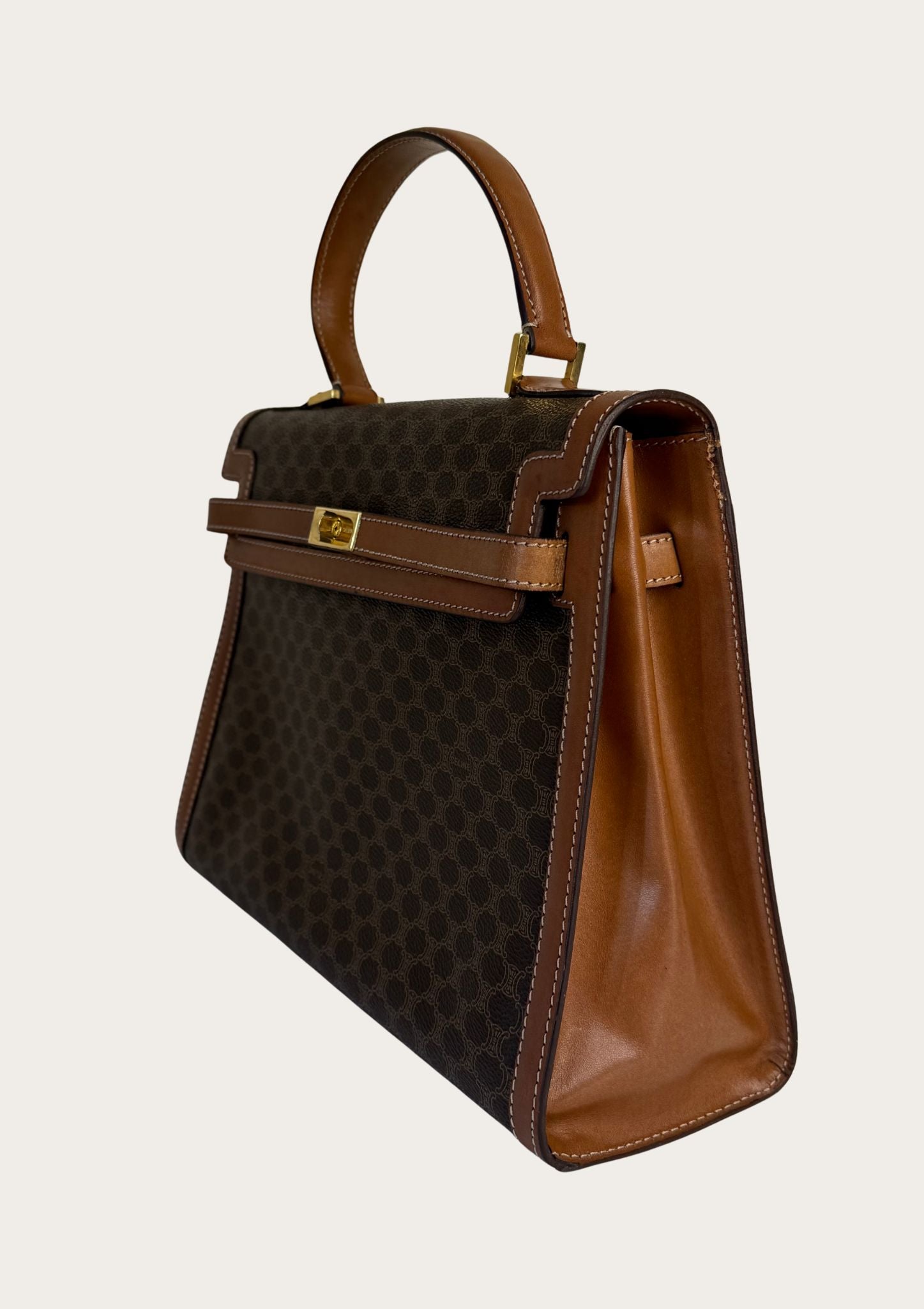 Authentic and vintage Celine top handle bag in macadam pattern