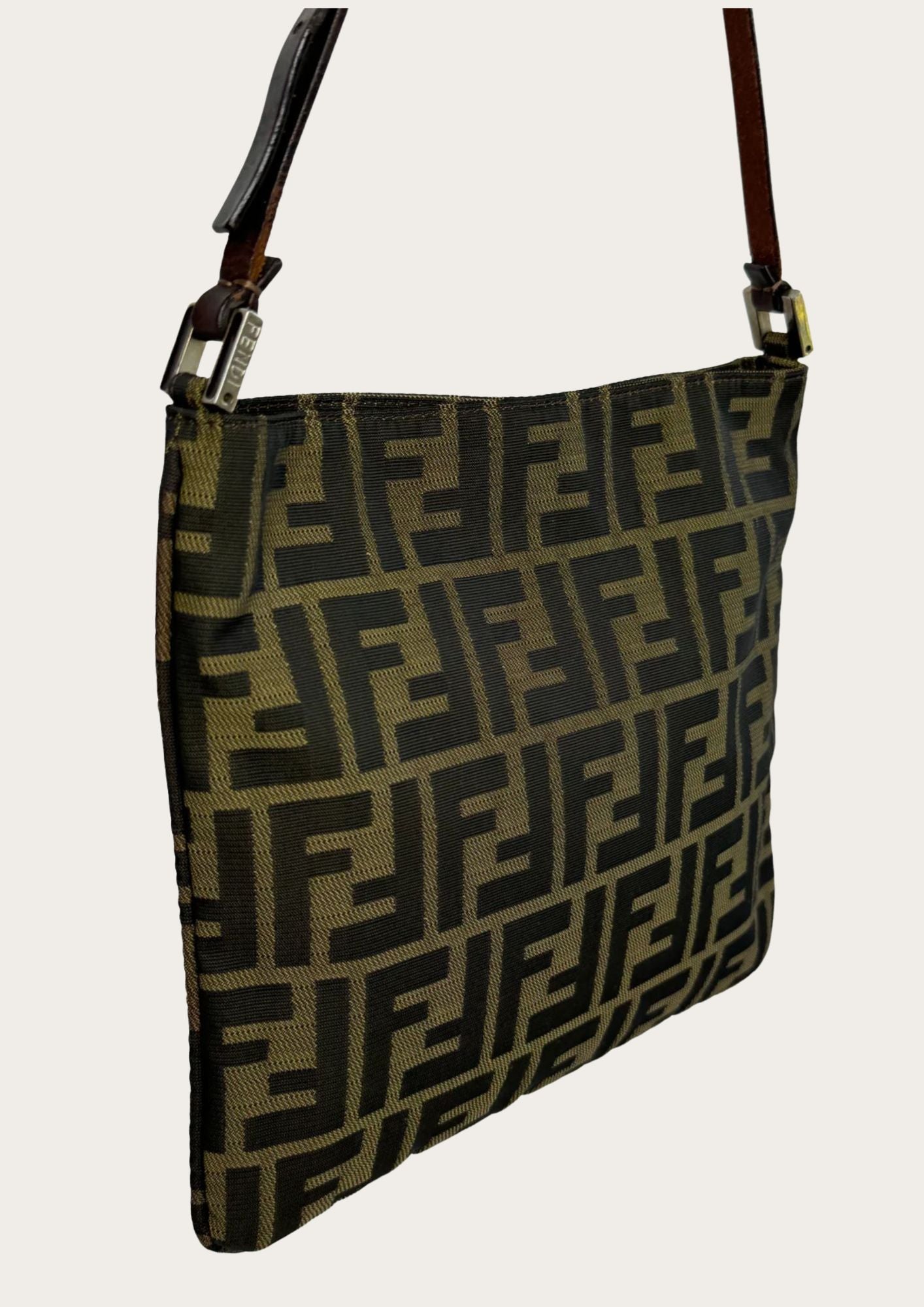 Genuine Fendi Zucca shoulder bag with leather shoulder strap.