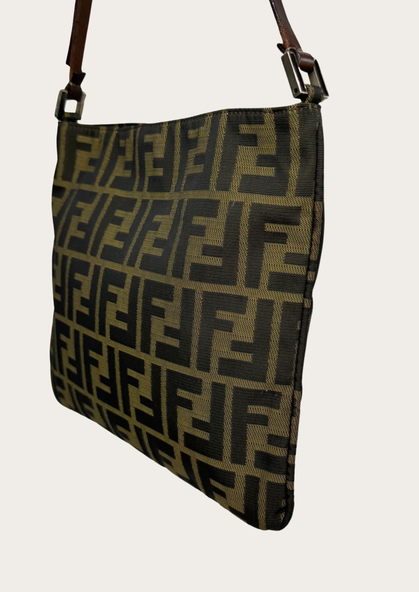 100% genuine Fendi Zucca shoulder bag with leather strap, side.